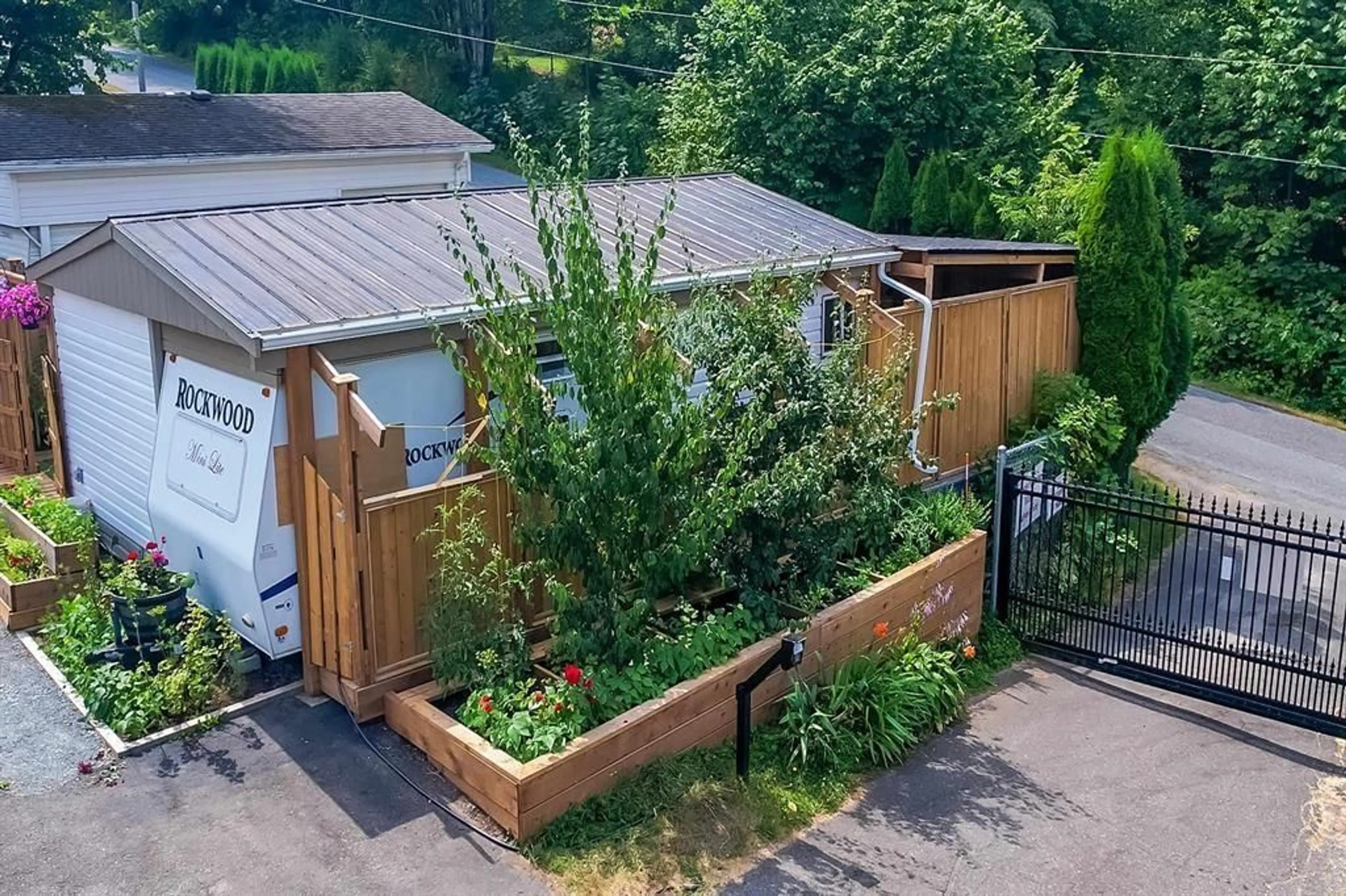 A pic from outside/outdoor area/front of a property/back of a property/a pic from drone, street for 158 - 1436 FROST ROAD, Lindell Beach British Columbia V2R4X8