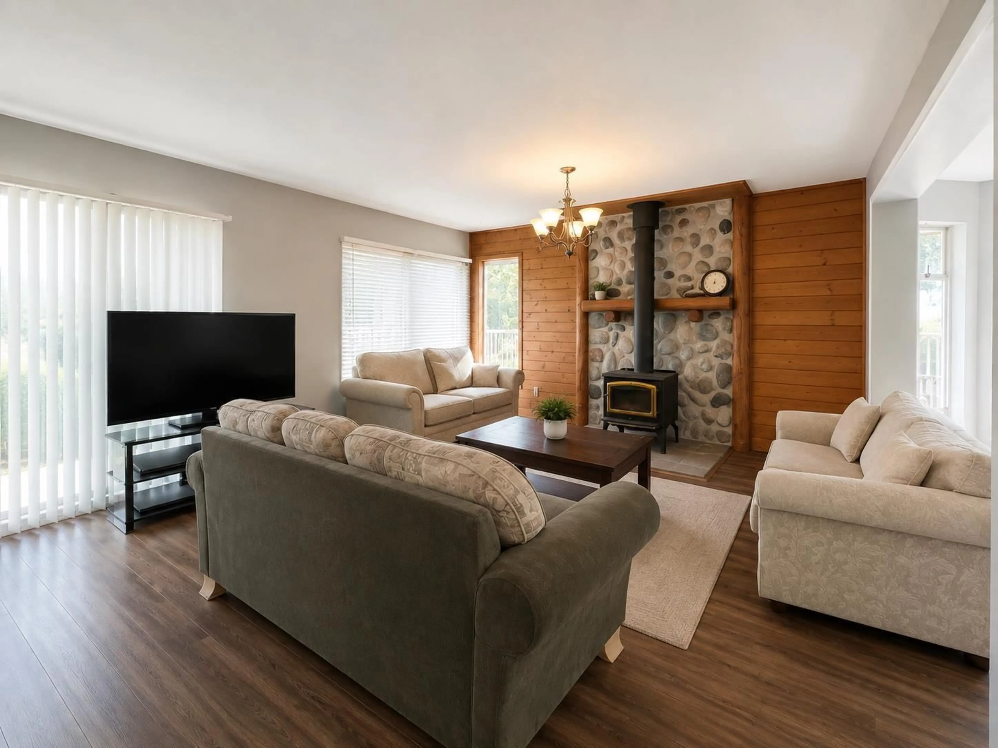 Living room with furniture, wood/laminate floor for 8309 THOMPSON ROAD, Mission British Columbia V0M1G0