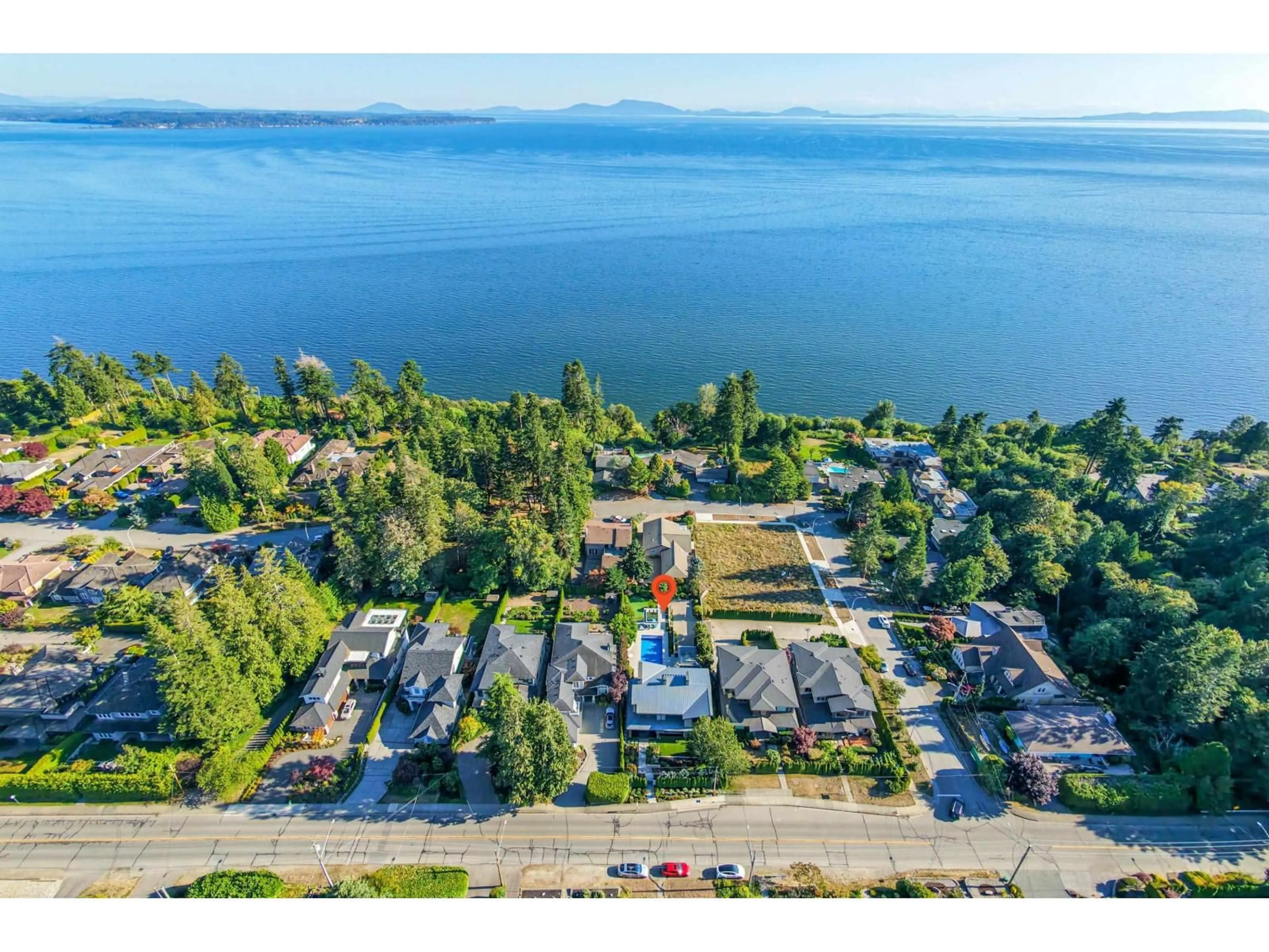 A pic from outside/outdoor area/front of a property/back of a property/a pic from drone, water/lake/river/ocean view for 13386 MARINE DRIVE, Surrey British Columbia V4A1G2