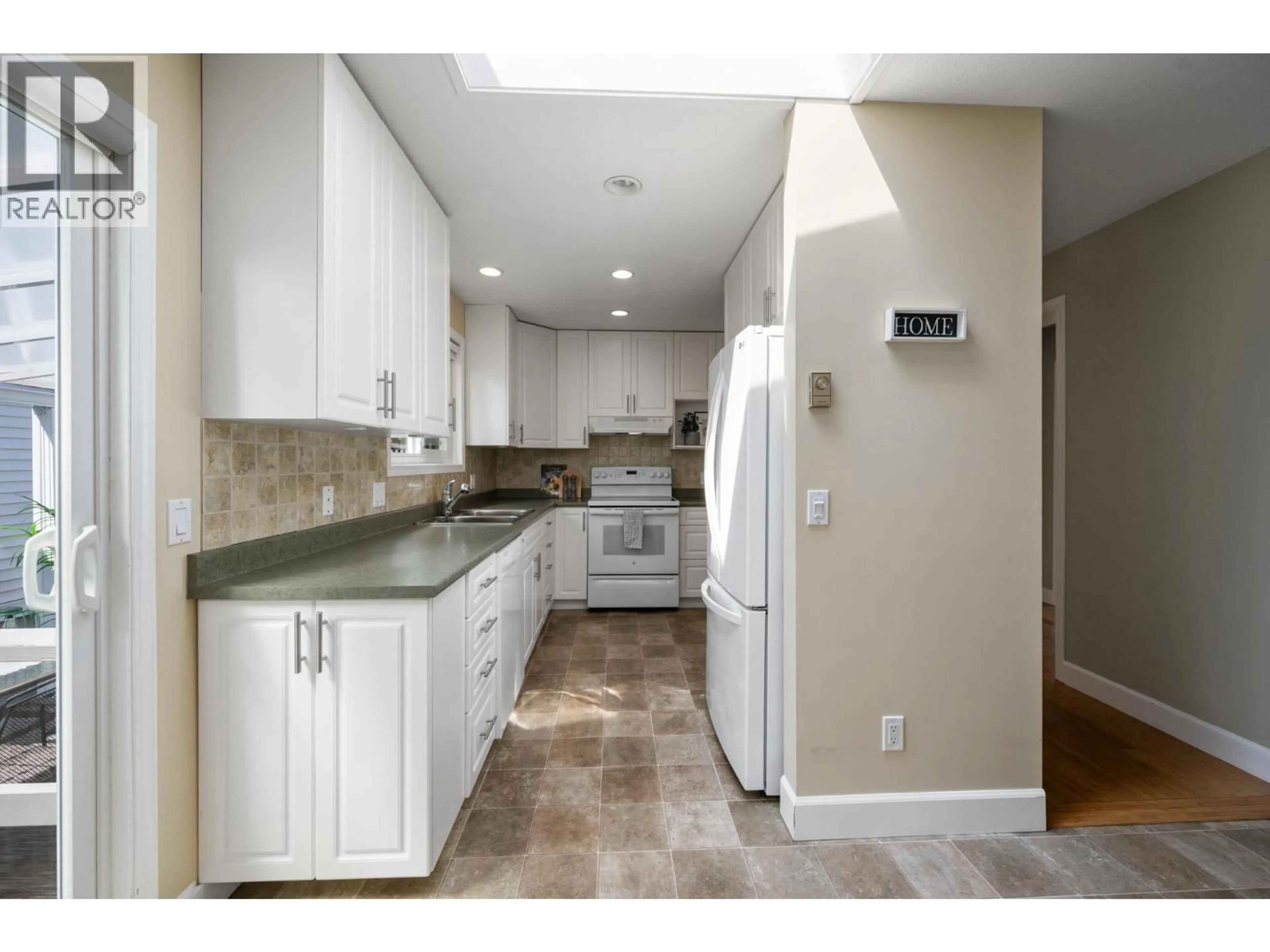 Standard kitchen, ceramic/tile floor for 5379 REGATTA WAY, Delta British Columbia V4K4R9