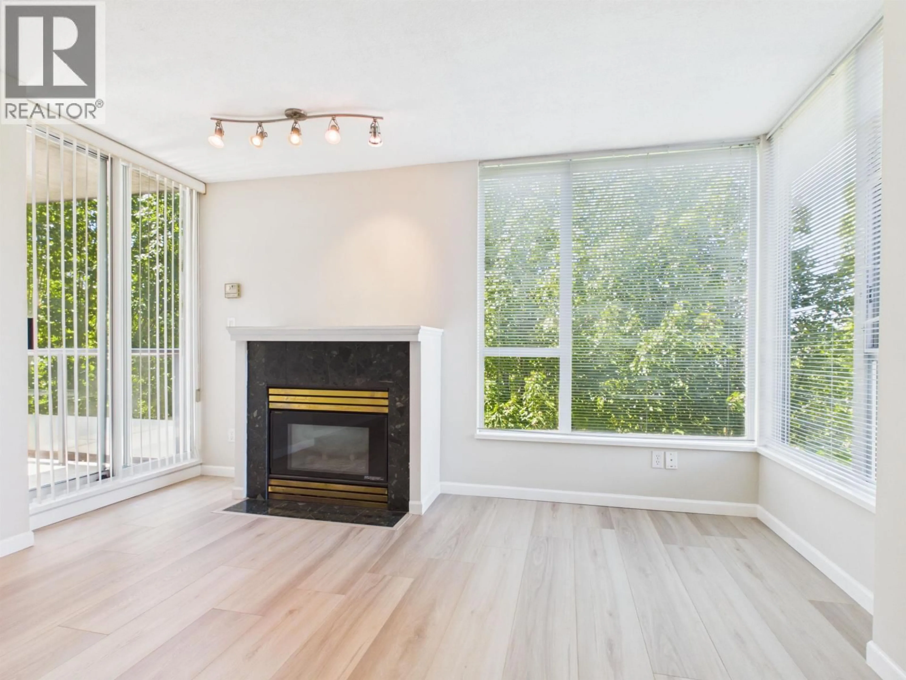 Living room with furniture, wood/laminate floor for 601 - 7077 BERESFORD STREET, Burnaby British Columbia V5E4J5