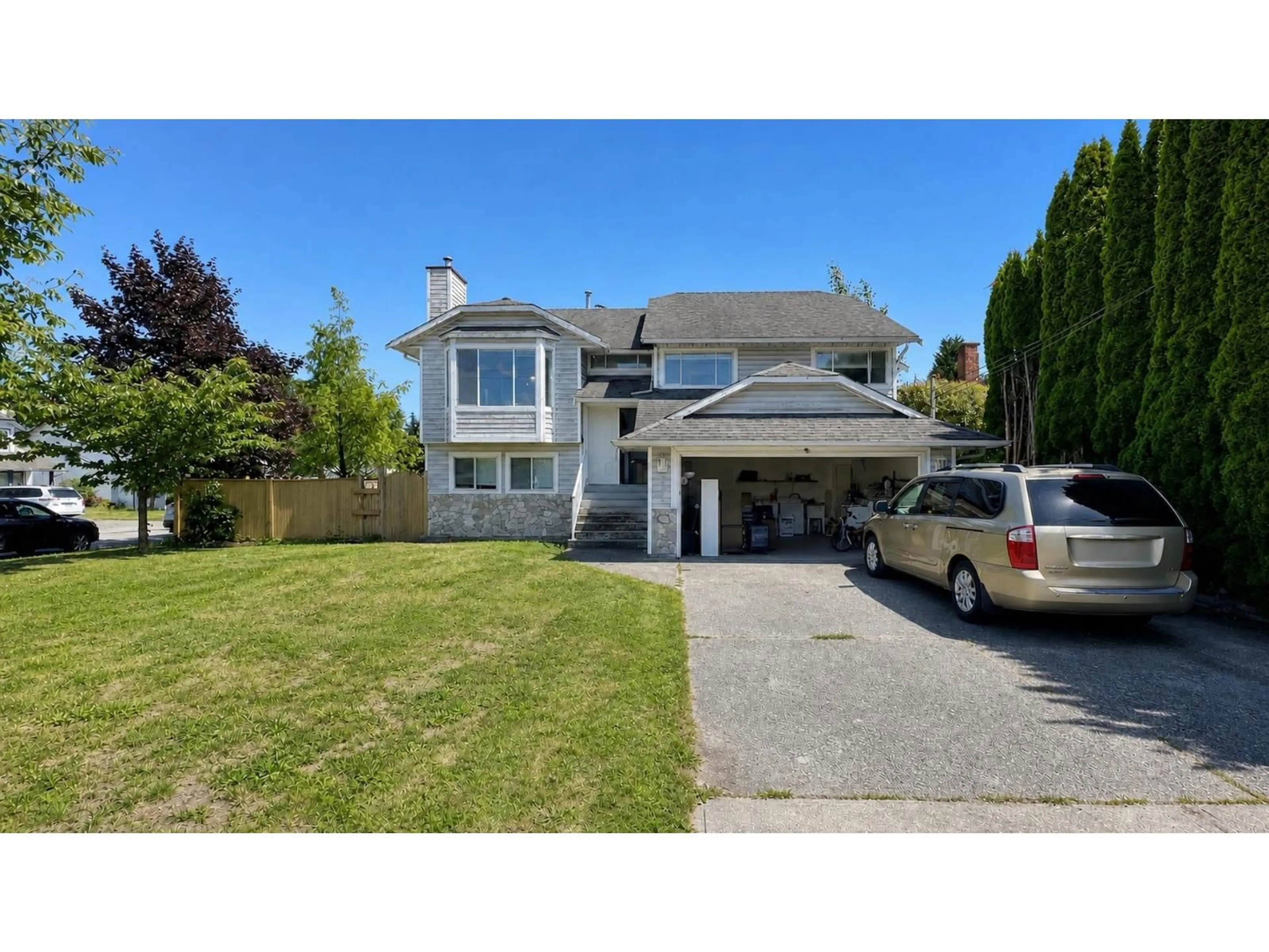 Home with vinyl exterior material, street for 15292 94 AVENUE, Surrey British Columbia V3R1E3