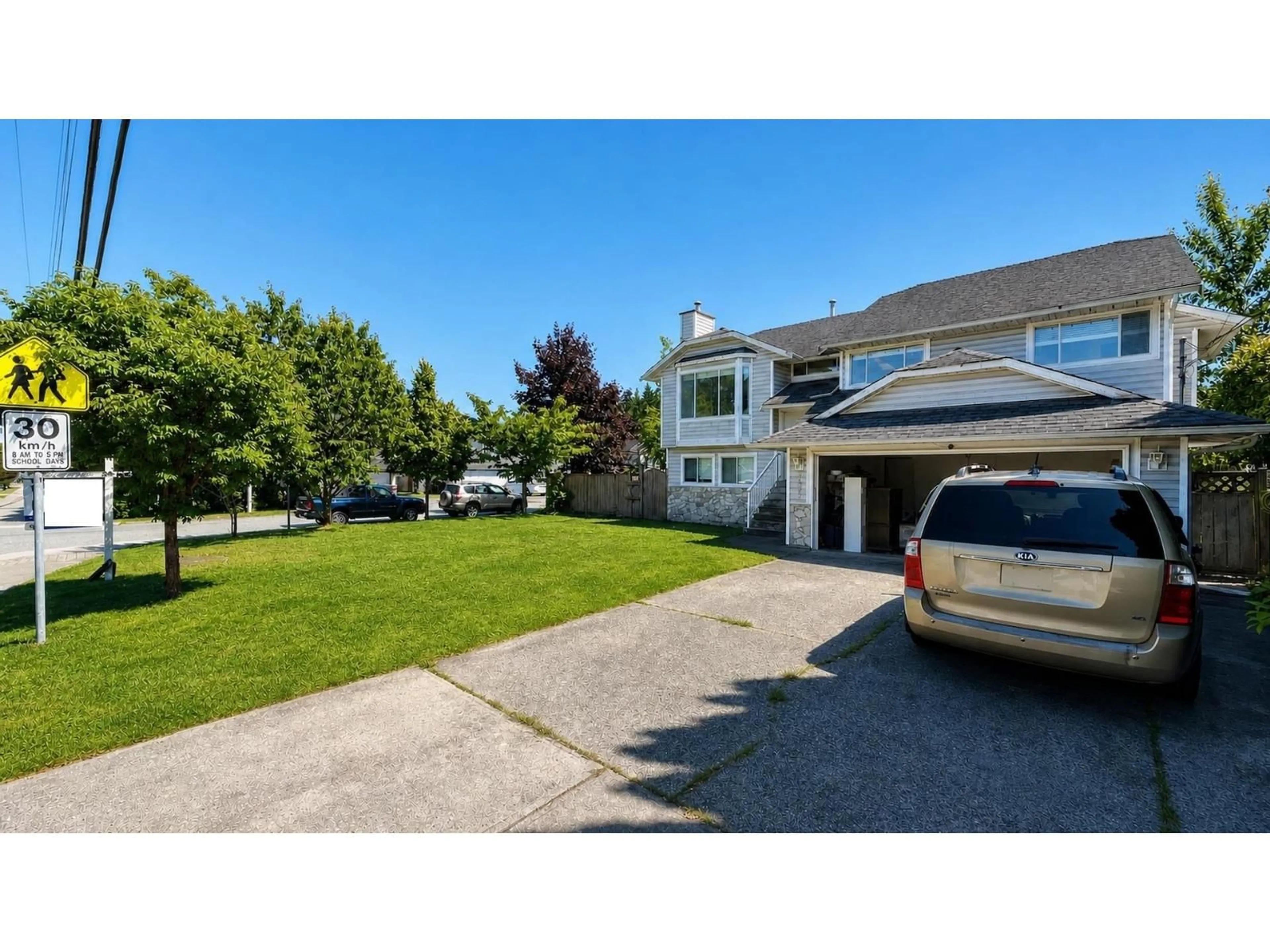 A pic from outside/outdoor area/front of a property/back of a property/a pic from drone, street for 15292 94 AVENUE, Surrey British Columbia V3R1E3