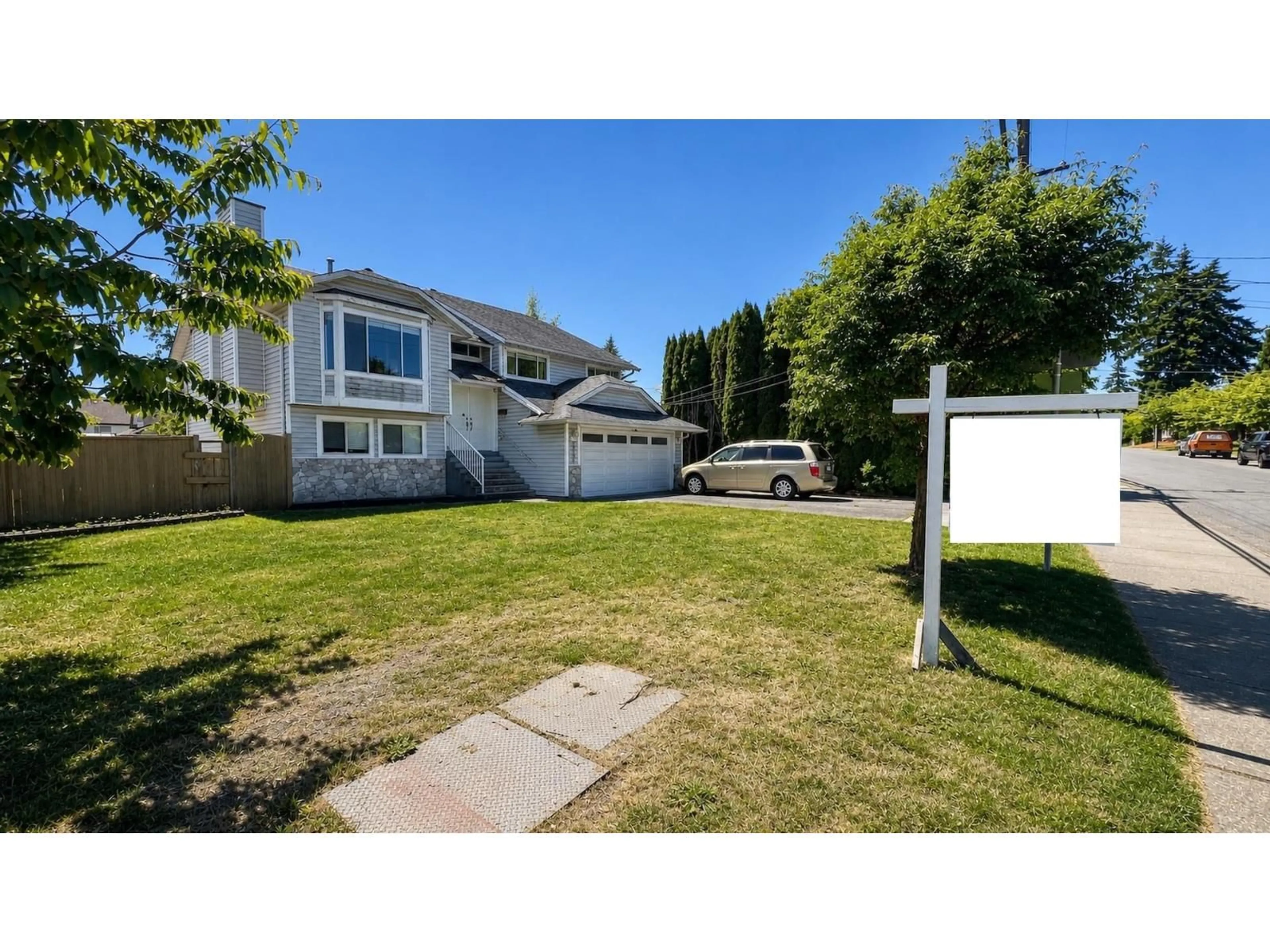 A pic from outside/outdoor area/front of a property/back of a property/a pic from drone, street for 15292 94 AVENUE, Surrey British Columbia V3R1E3