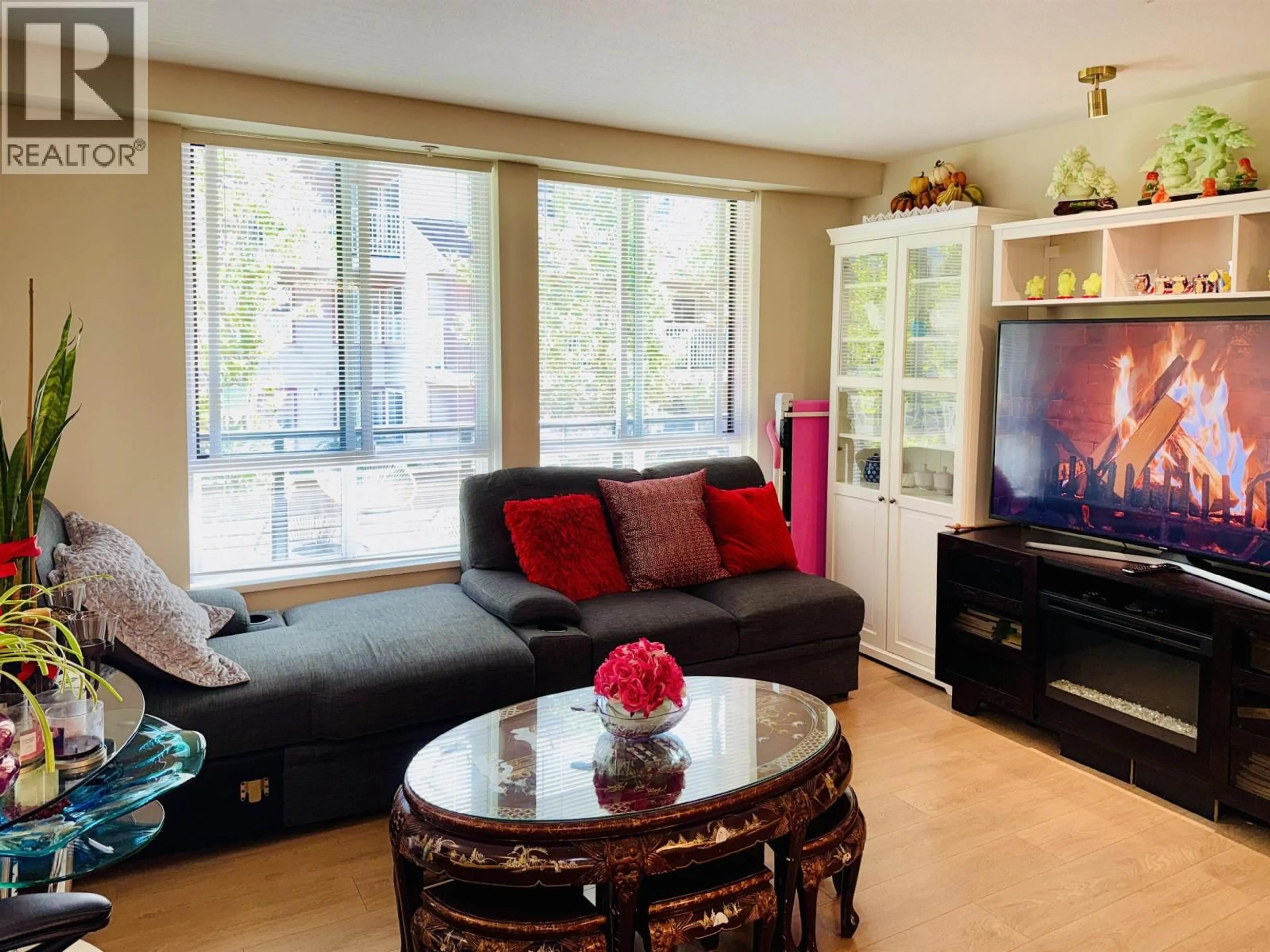 Living room with furniture, wood/laminate floor for 49 - 3728 THURSTON STREET, Burnaby British Columbia V5H0E6