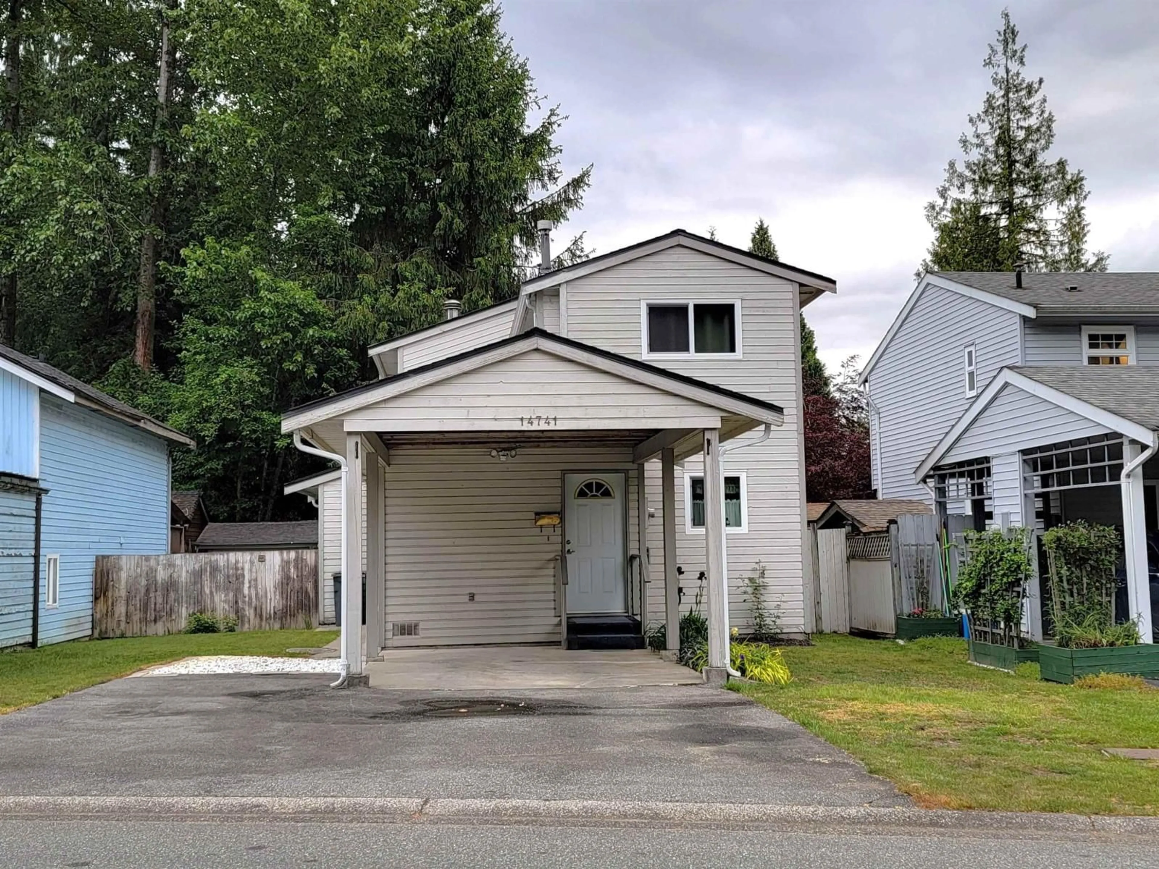 Home with vinyl exterior material, street for 14741 101A AVENUE, Surrey British Columbia V3R7E7