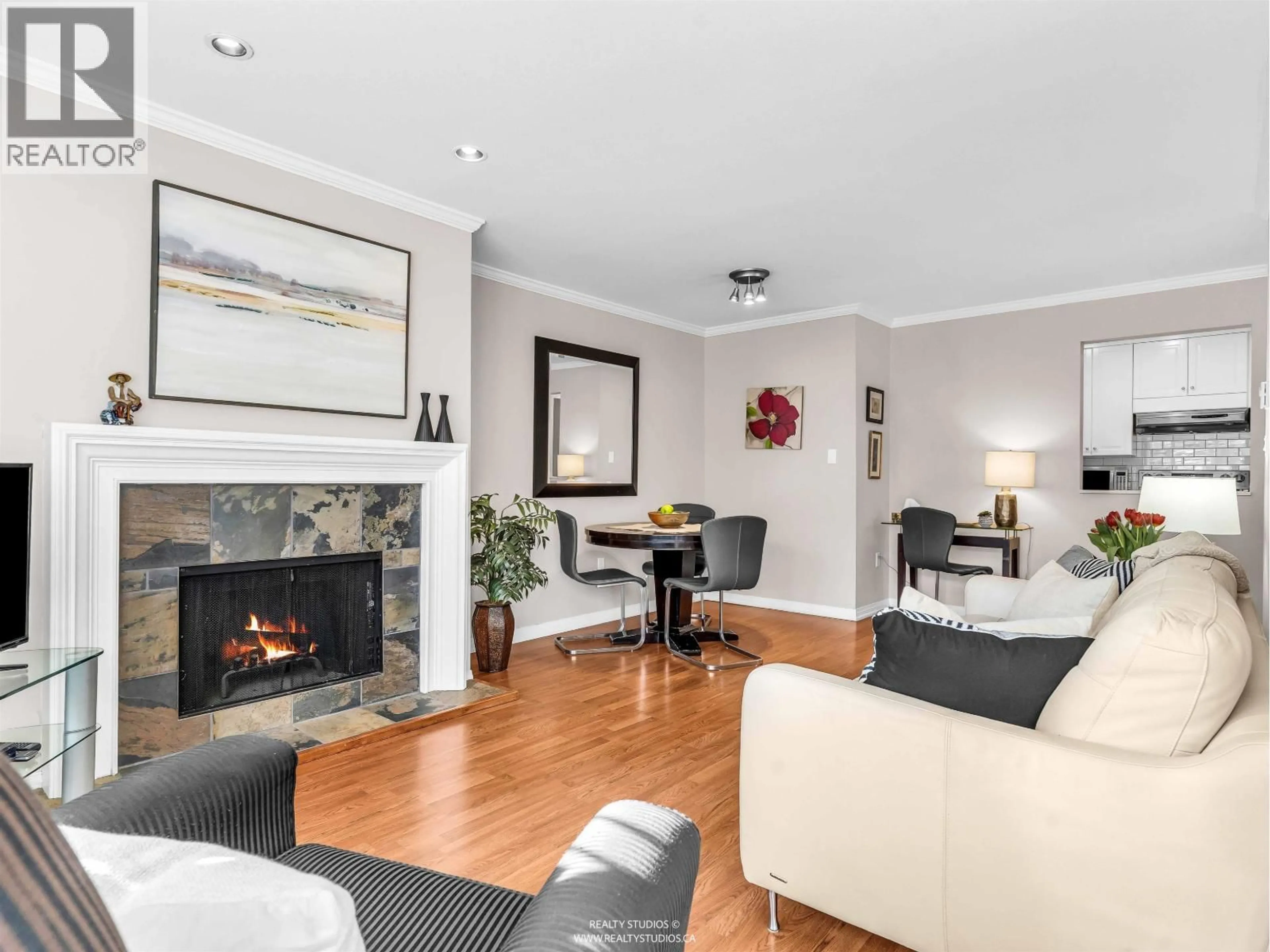 Living room with furniture, wood/laminate floor for 109 - 555 14TH AVENUE, Vancouver British Columbia V5Z4G8