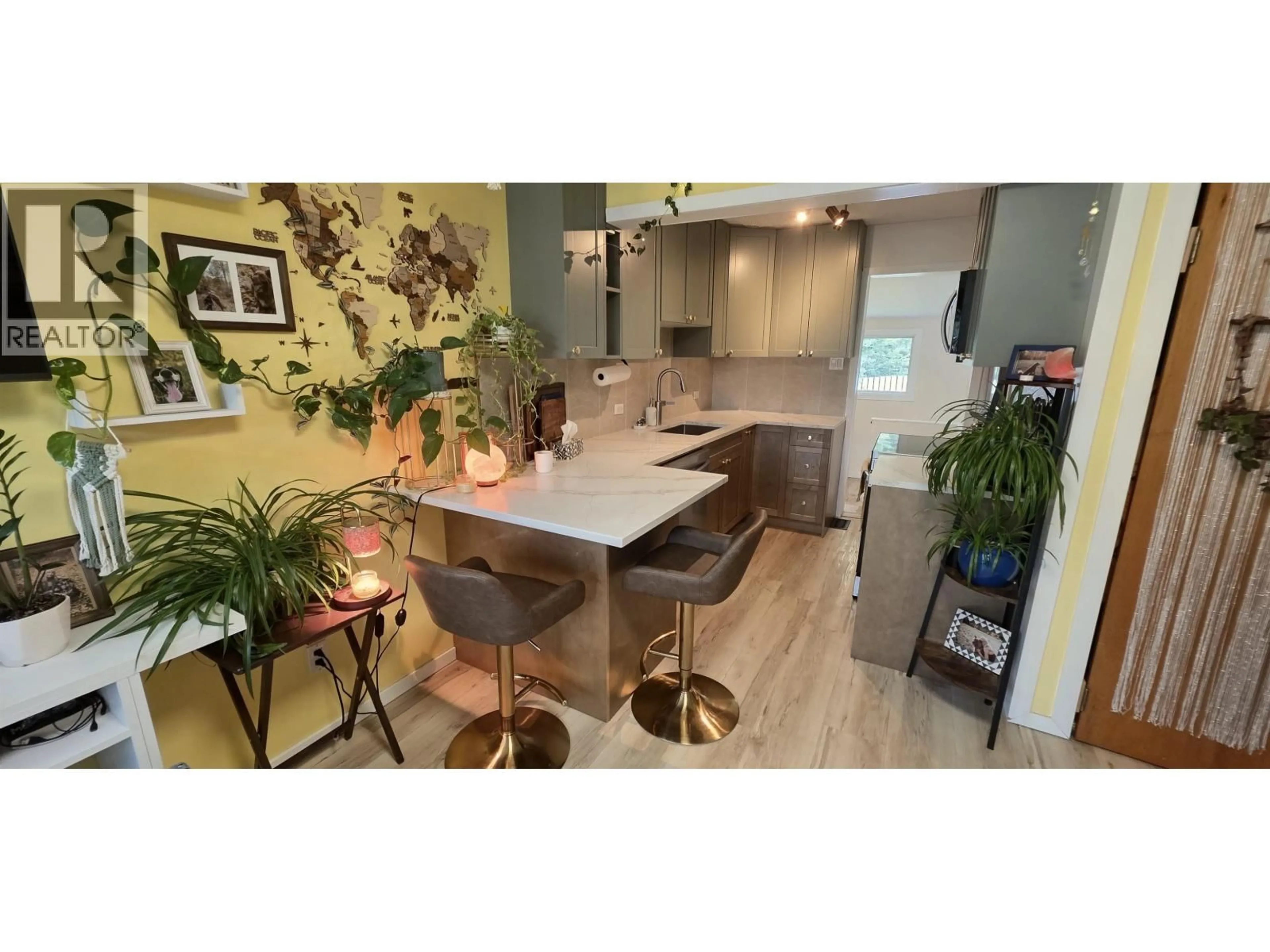 Open concept kitchen, wood/laminate floor for 2294 MARIO PLACE, Prince George British Columbia V2K3K1