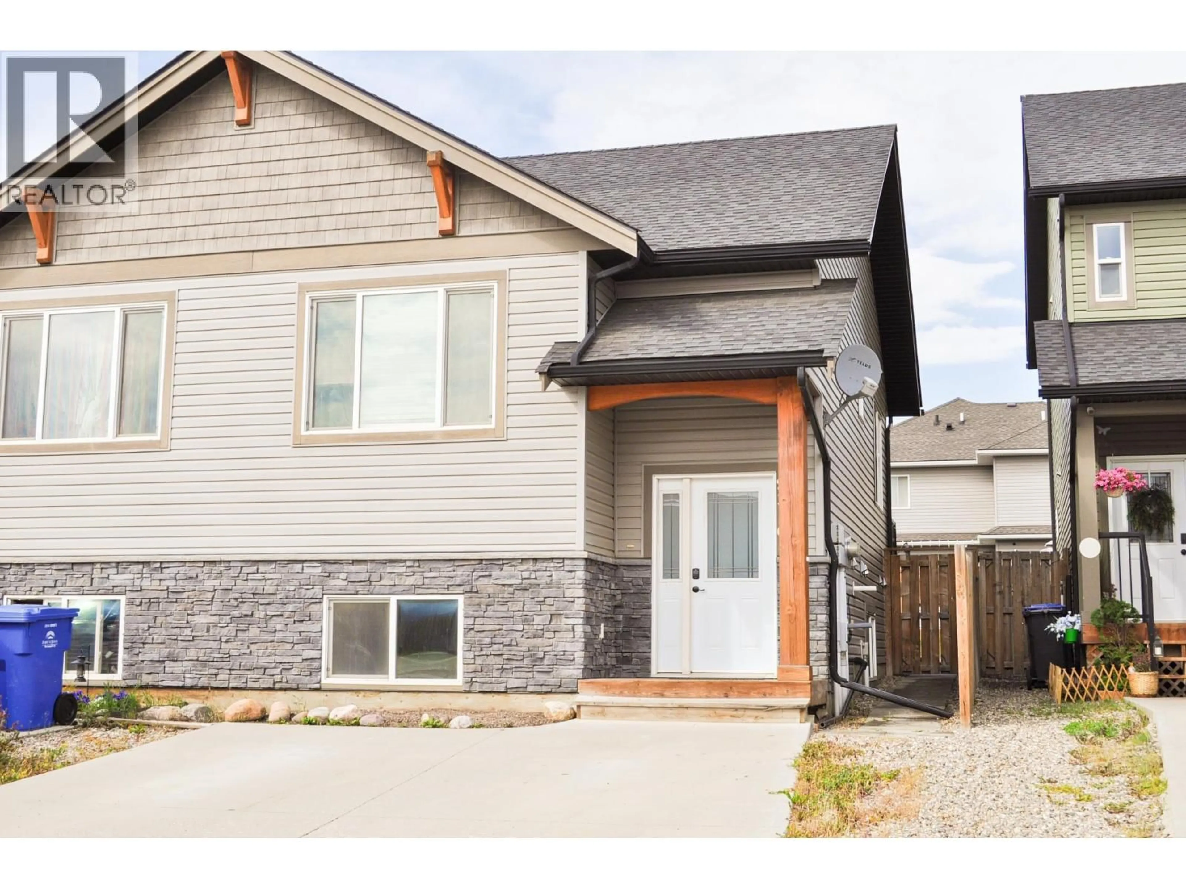 Home with brick exterior material, street for 8316 87 AVENUE, Fort St. John British Columbia V1J0K8