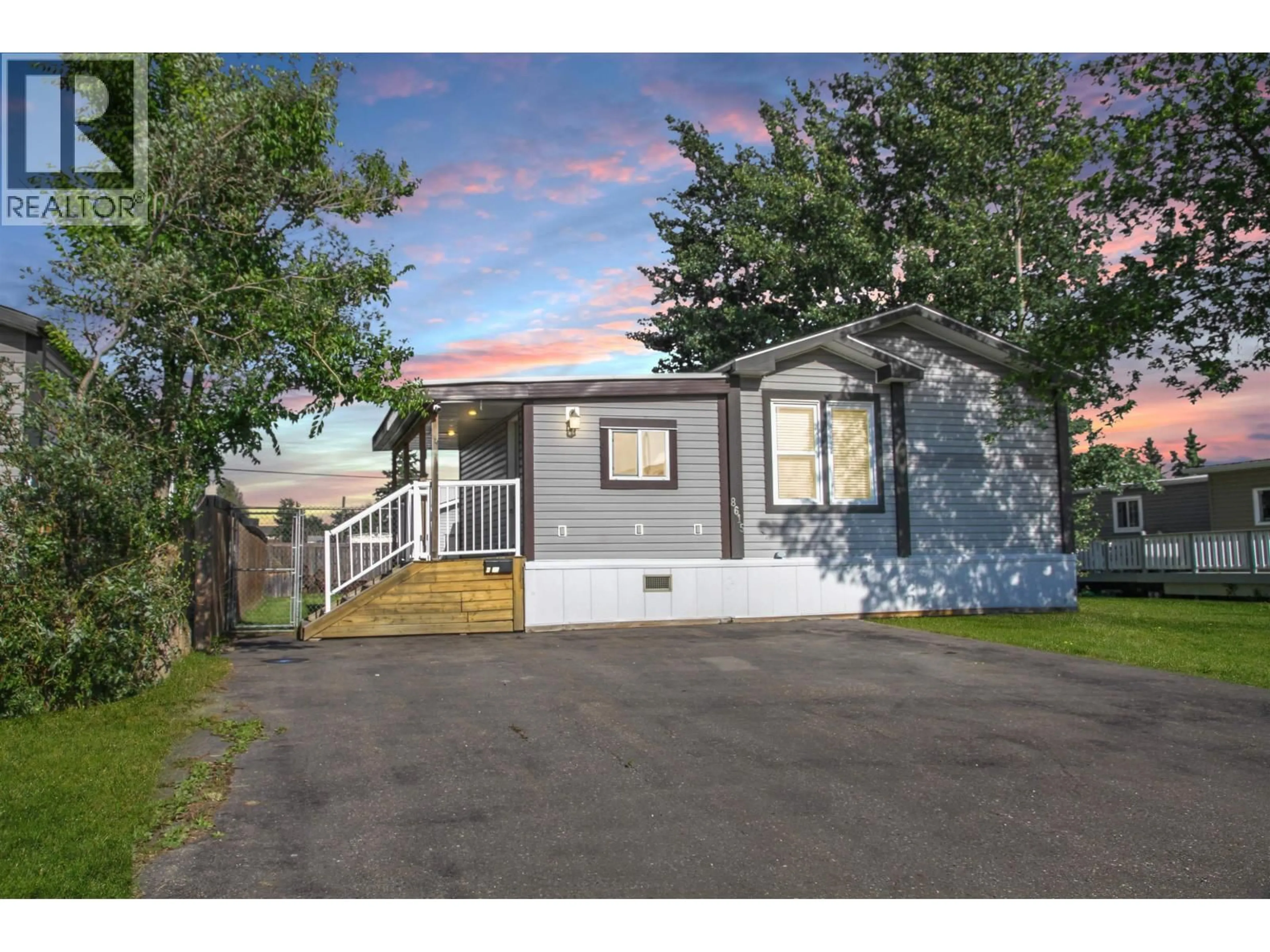Home with vinyl exterior material, street for 8615 77 STREET, Fort St. John British Columbia V1J3A1