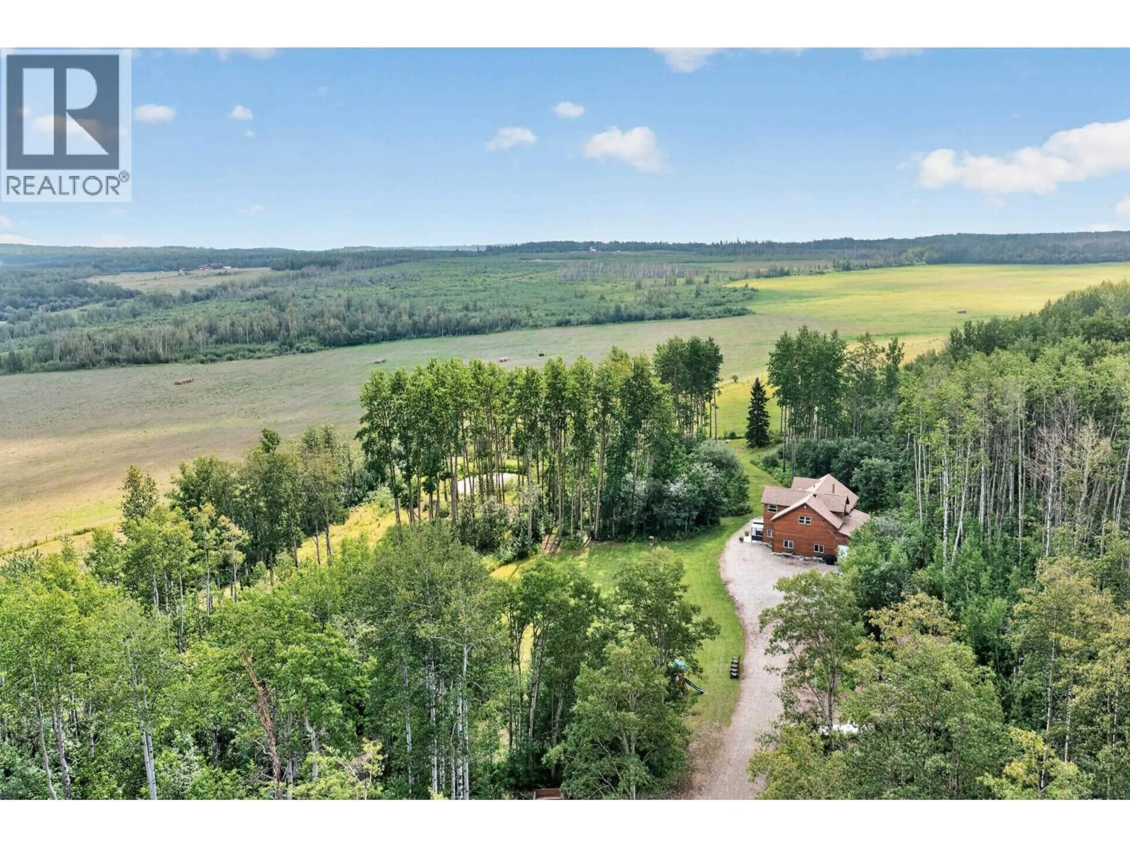 A pic from outside/outdoor area/front of a property/back of a property/a pic from drone, forest/trees view for 13603 WOLSEY SUBDIV, Fort St. John British Columbia V1J8L6