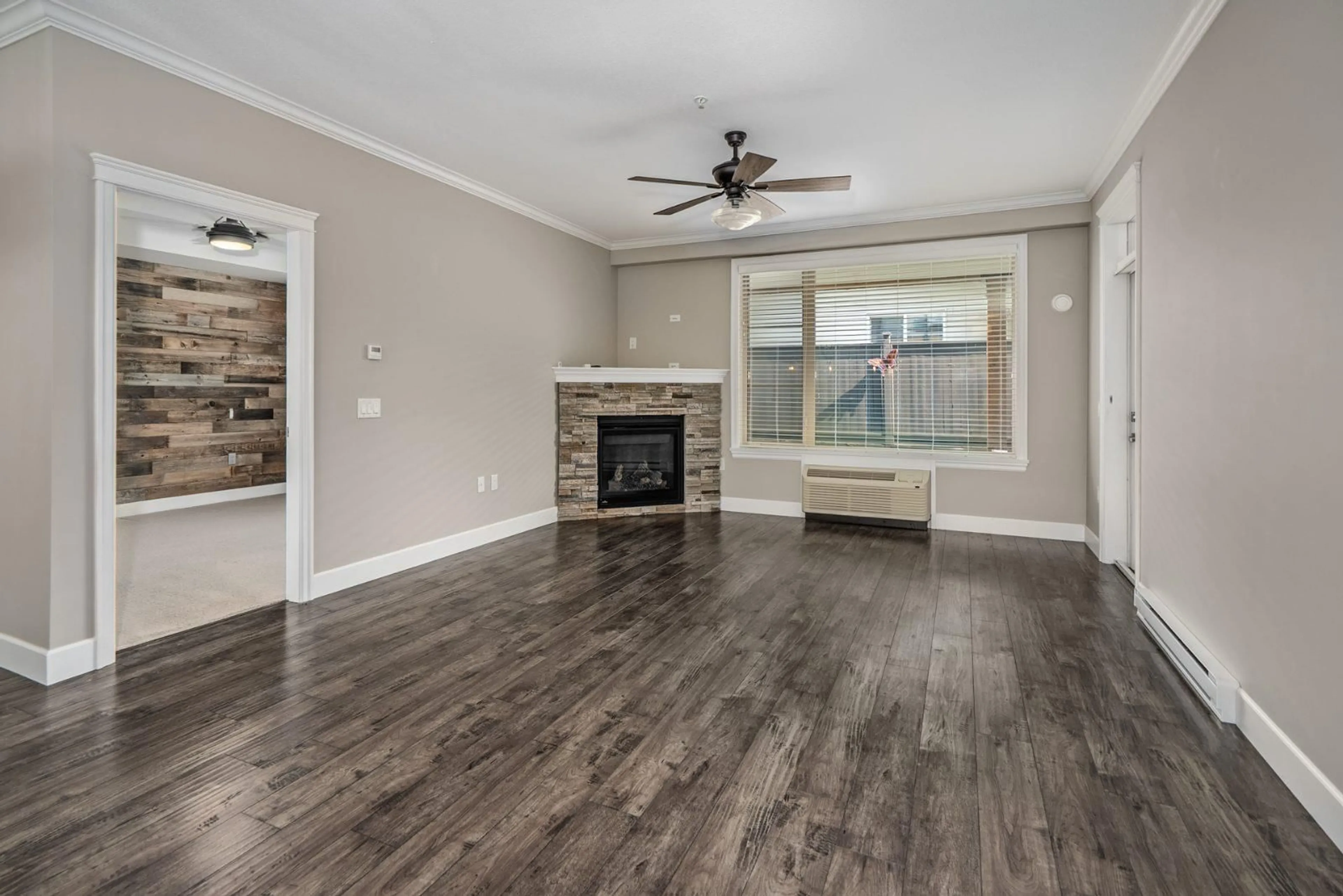Living room with furniture, wood/laminate floor for 108 - 45754 KEITH WILSON ROAD, Chilliwack British Columbia V2R6A9