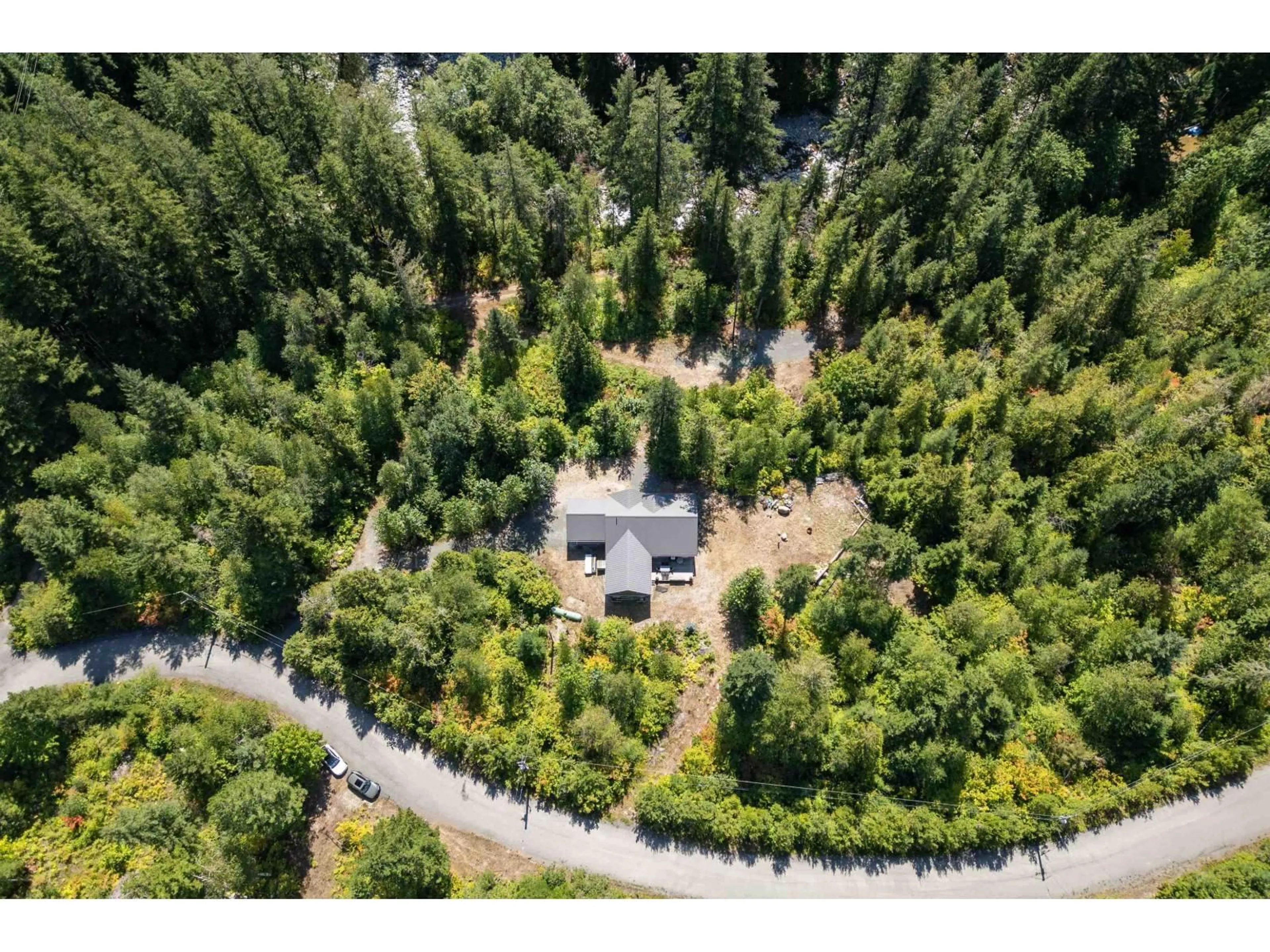 A pic from outside/outdoor area/front of a property/back of a property/a pic from drone, forest/trees view for 65356 WOTTEN ROAD, Hope British Columbia V0X1L3