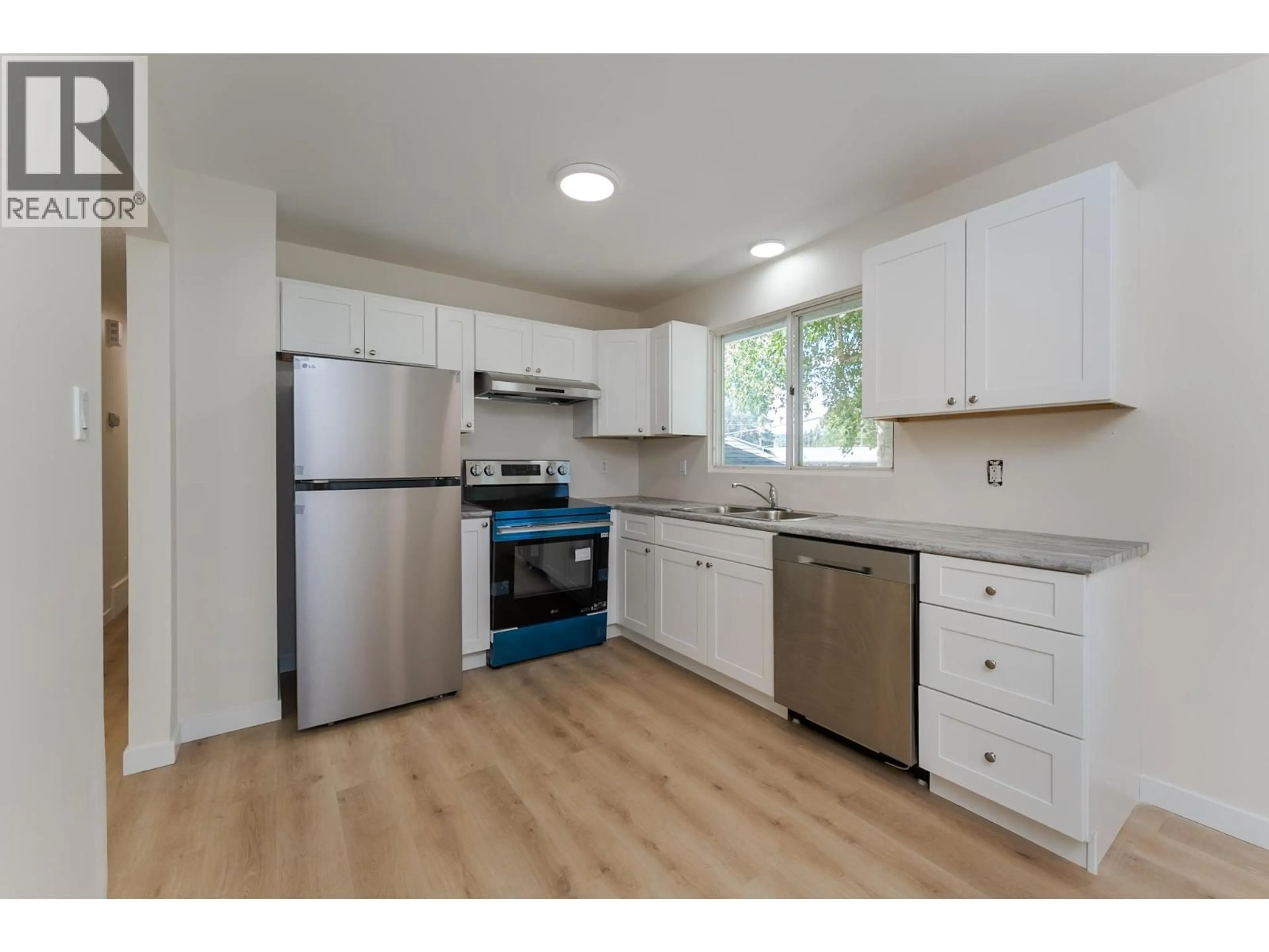 Standard kitchen, wood/laminate floor for 1575 VAN BIEN AVENUE, Prince George British Columbia V2L4N8