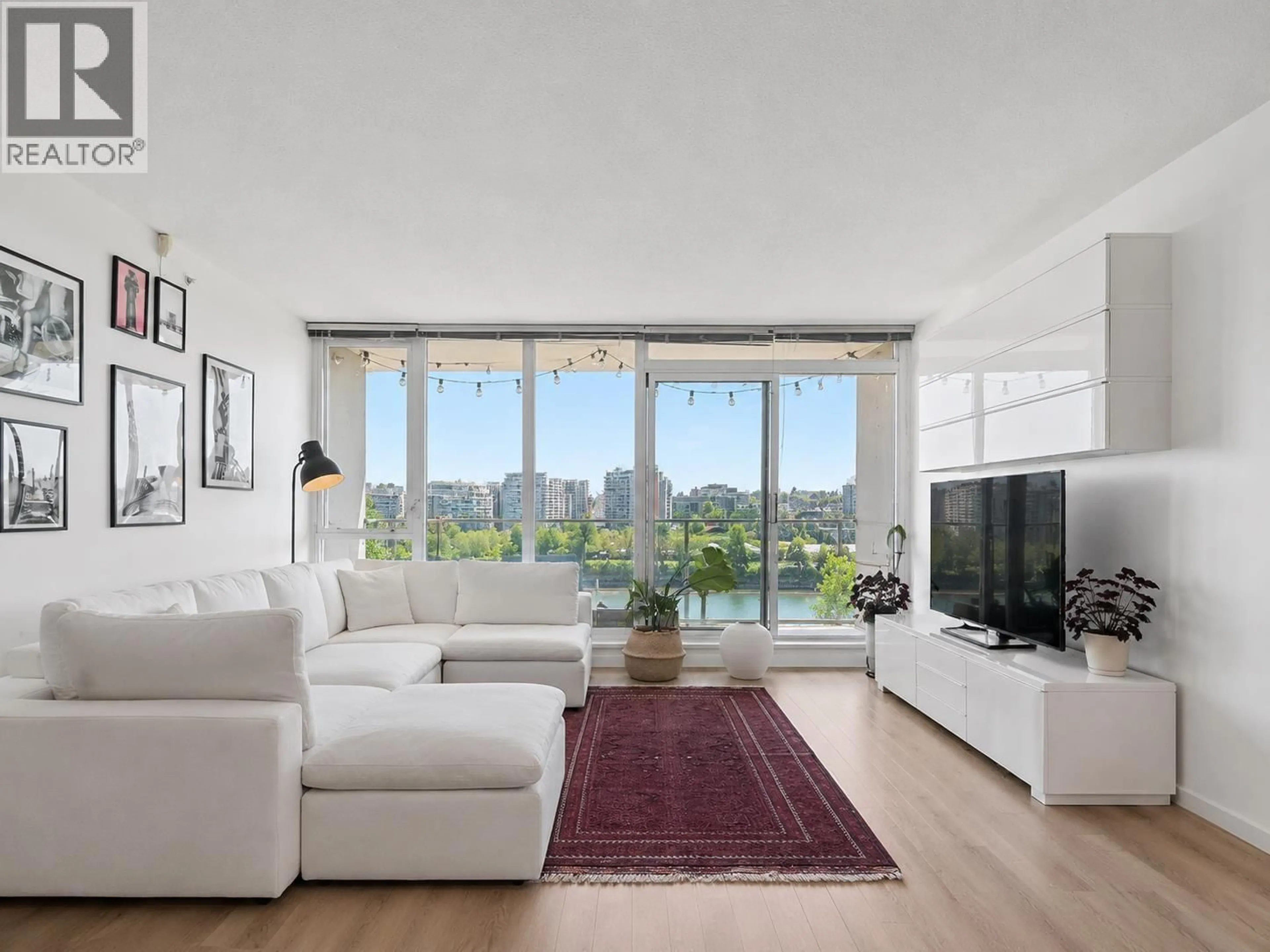 Living room with furniture, unknown for 801 - 980 COOPERAGE WAY, Vancouver British Columbia V6B0C3