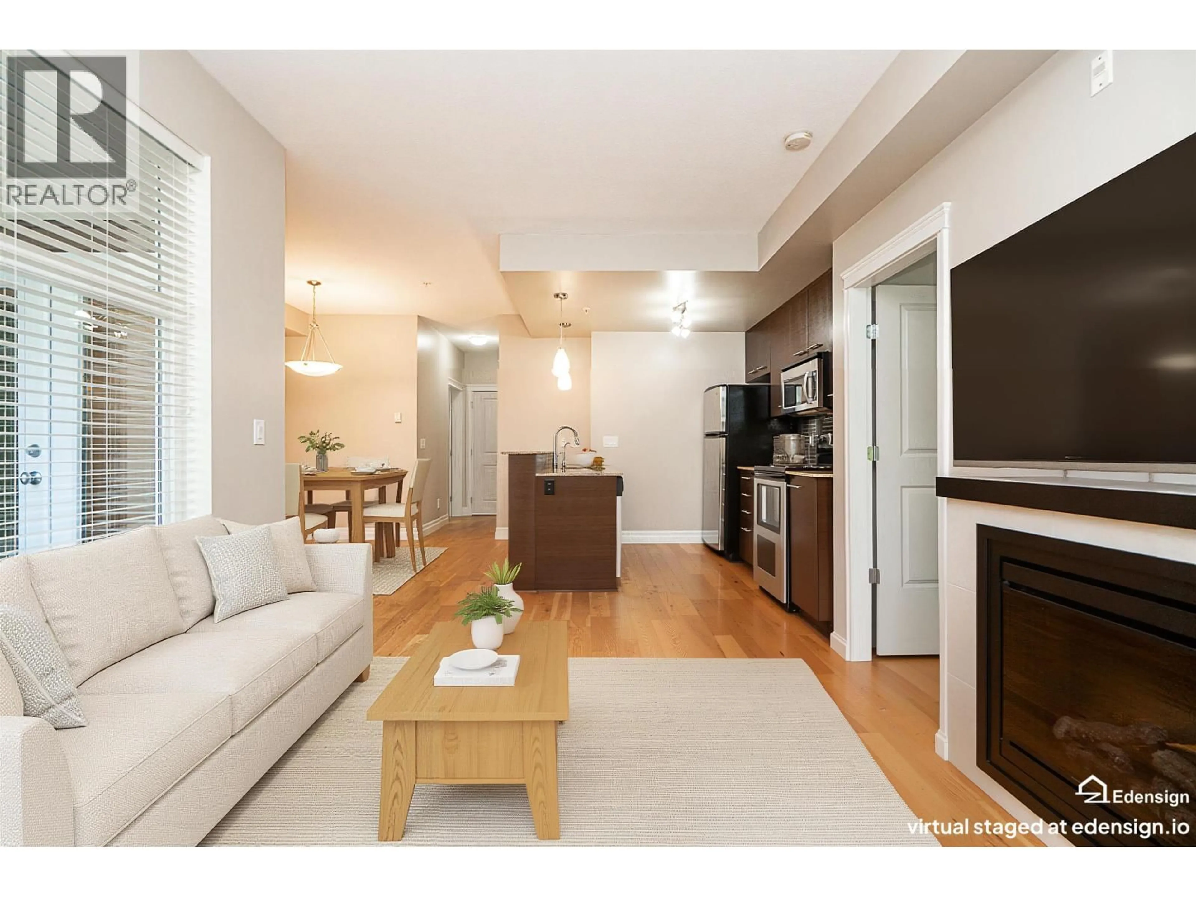 Living room with furniture, wood/laminate floor for 201 - 2343 ATKINS AVENUE, Port Coquitlam British Columbia V3C1Y7