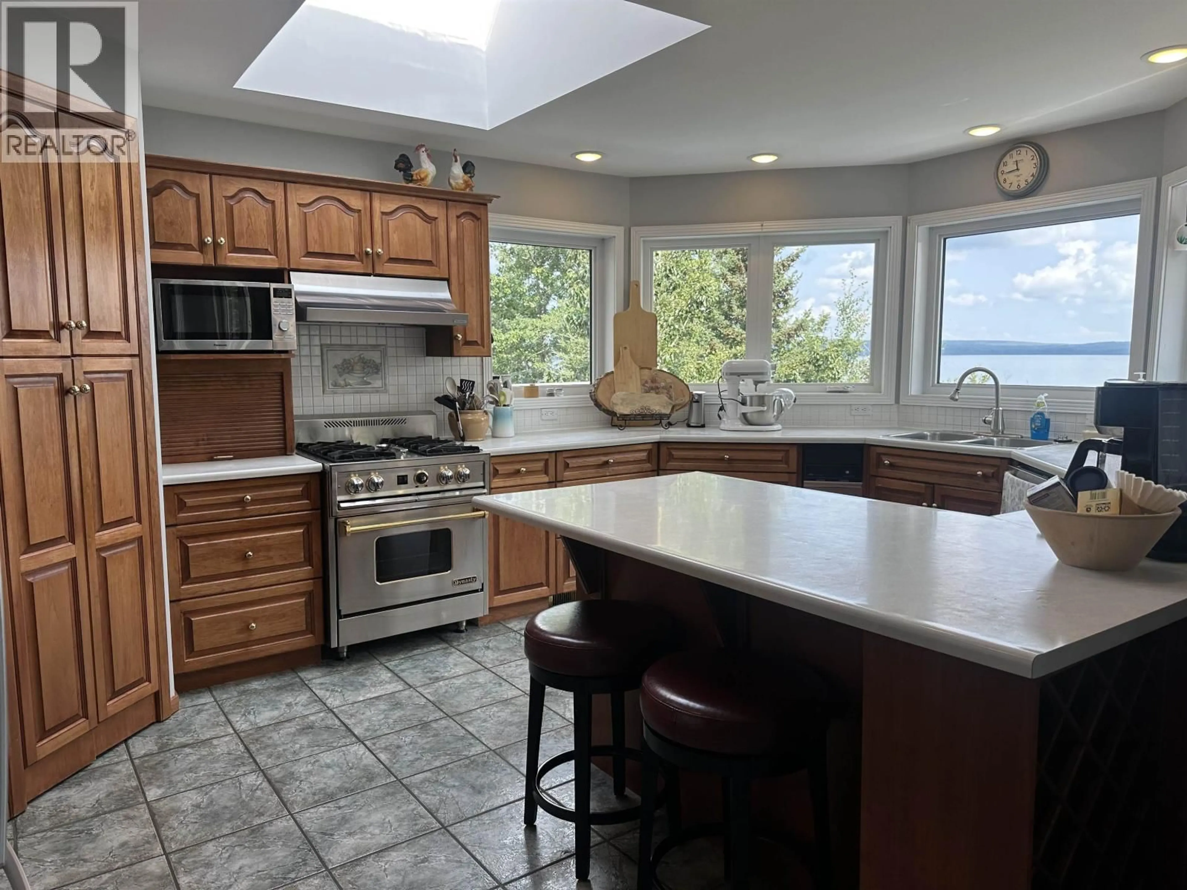 Open concept kitchen, ceramic/tile floor for 13345 CHARLIE LAKE CRESCENT, Charlie Lake British Columbia V0C1H0
