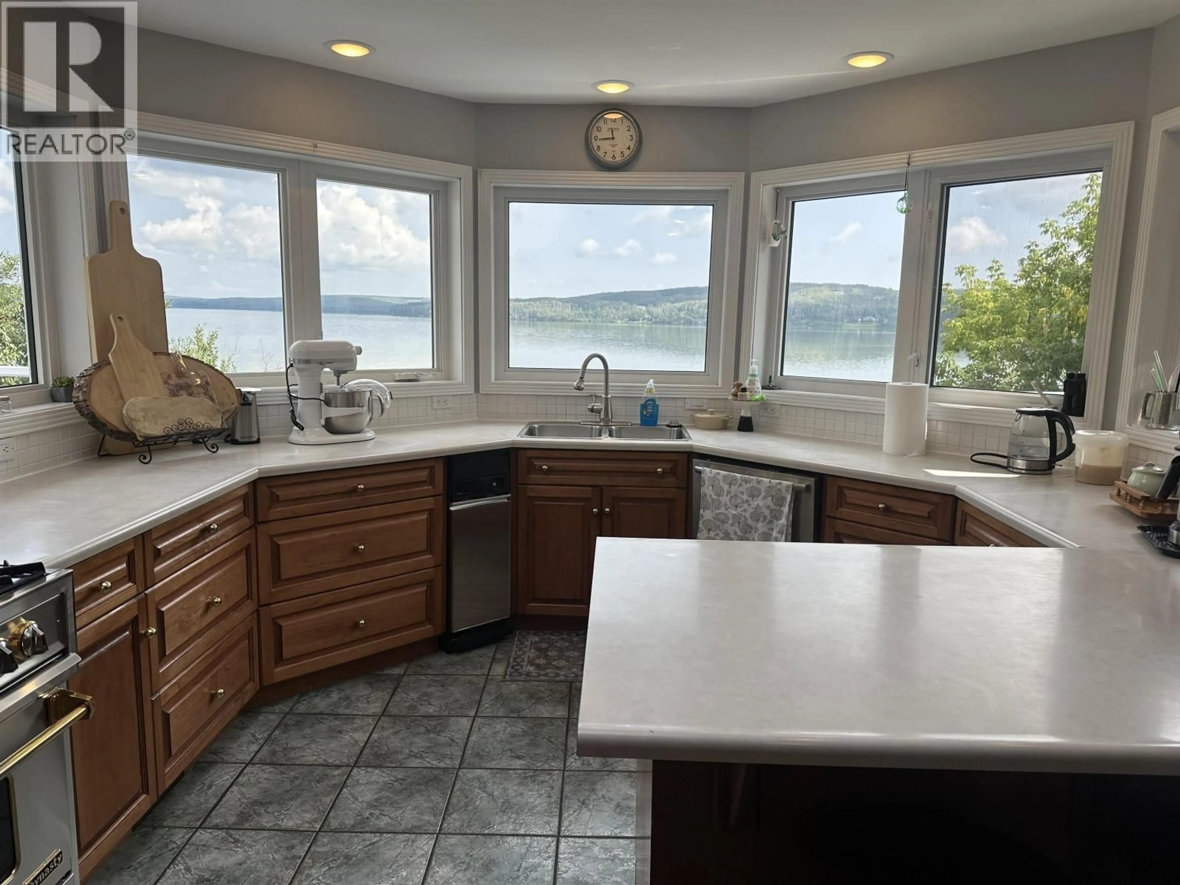 Open concept kitchen, ceramic/tile floor for 13345 CHARLIE LAKE CRESCENT, Charlie Lake British Columbia V0C1H0
