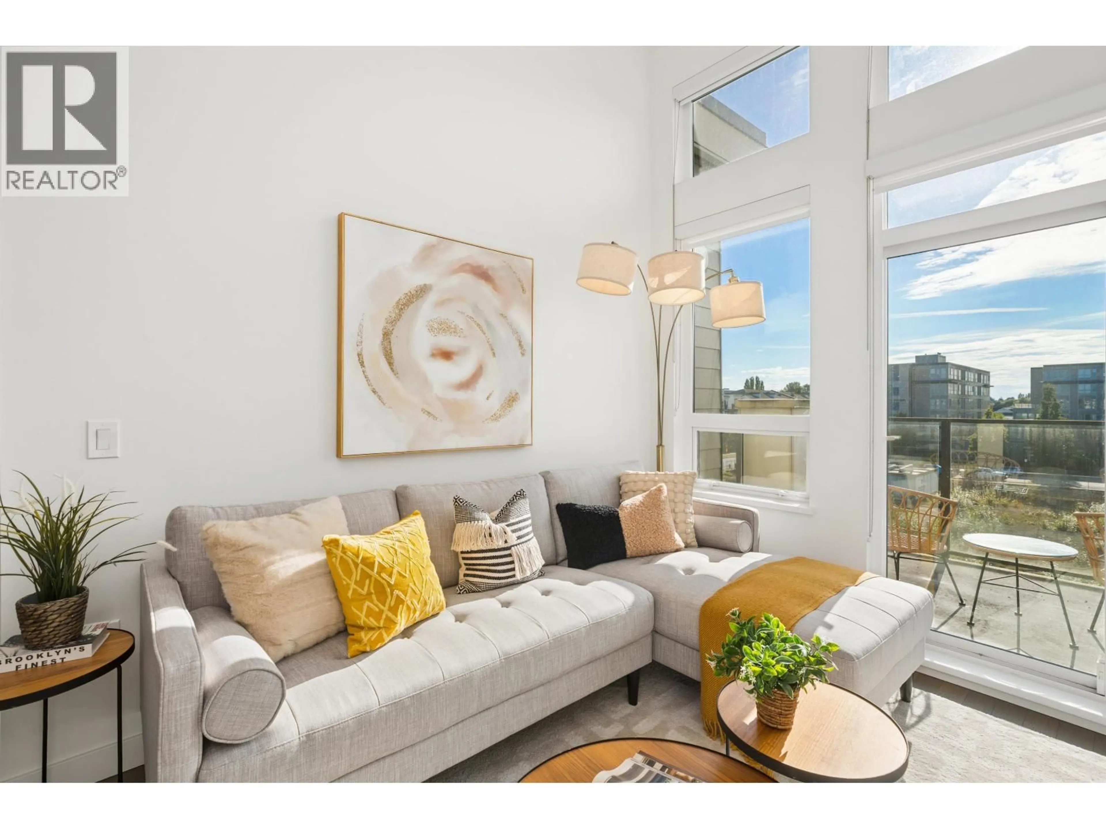 Living room with furniture, wood/laminate floor for 421 - 4033 MAY DRIVE, Richmond British Columbia V6X0T3