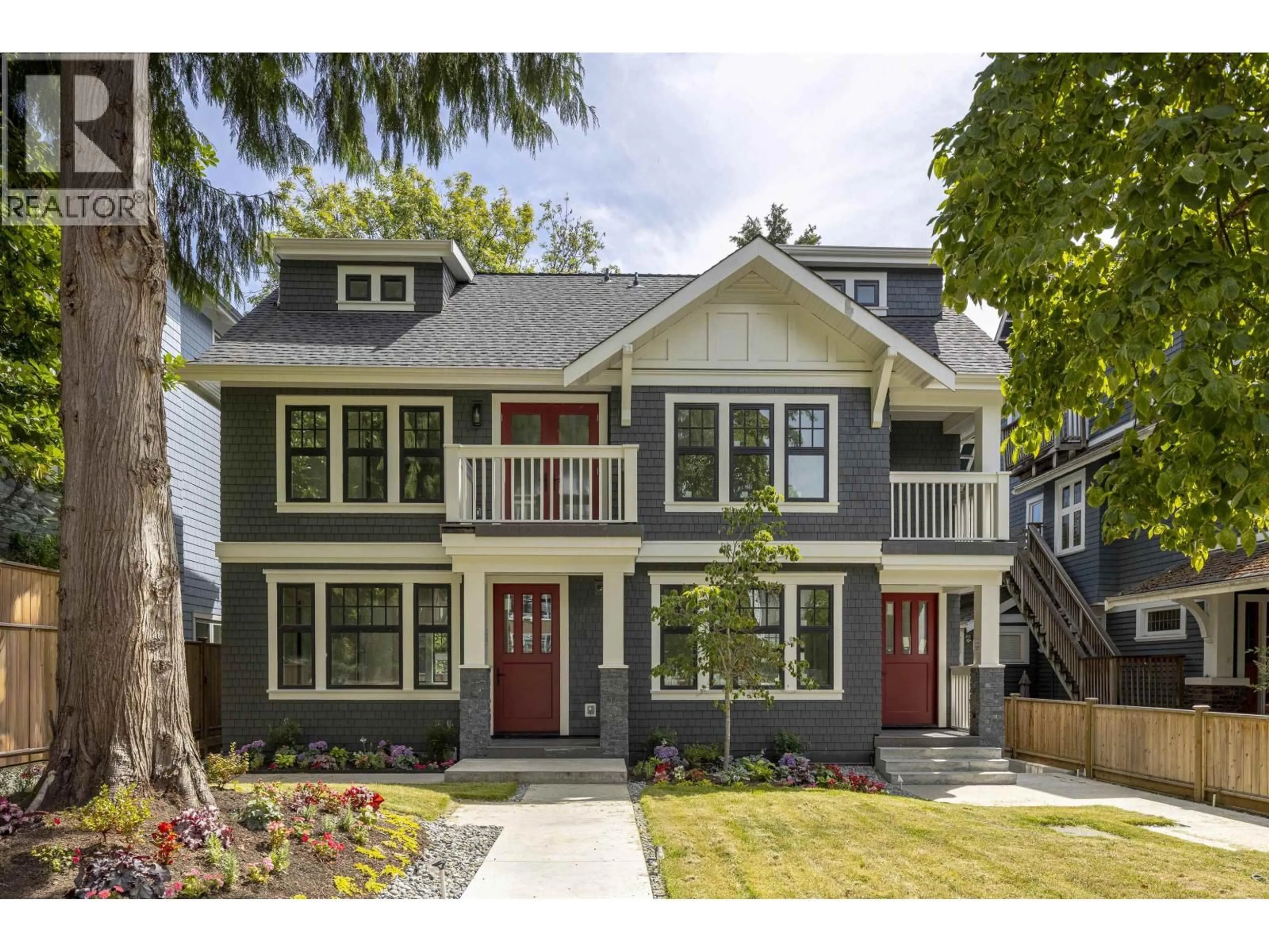 Home with vinyl exterior material, street for 2568 2ND AVENUE, Vancouver British Columbia V6K1J8