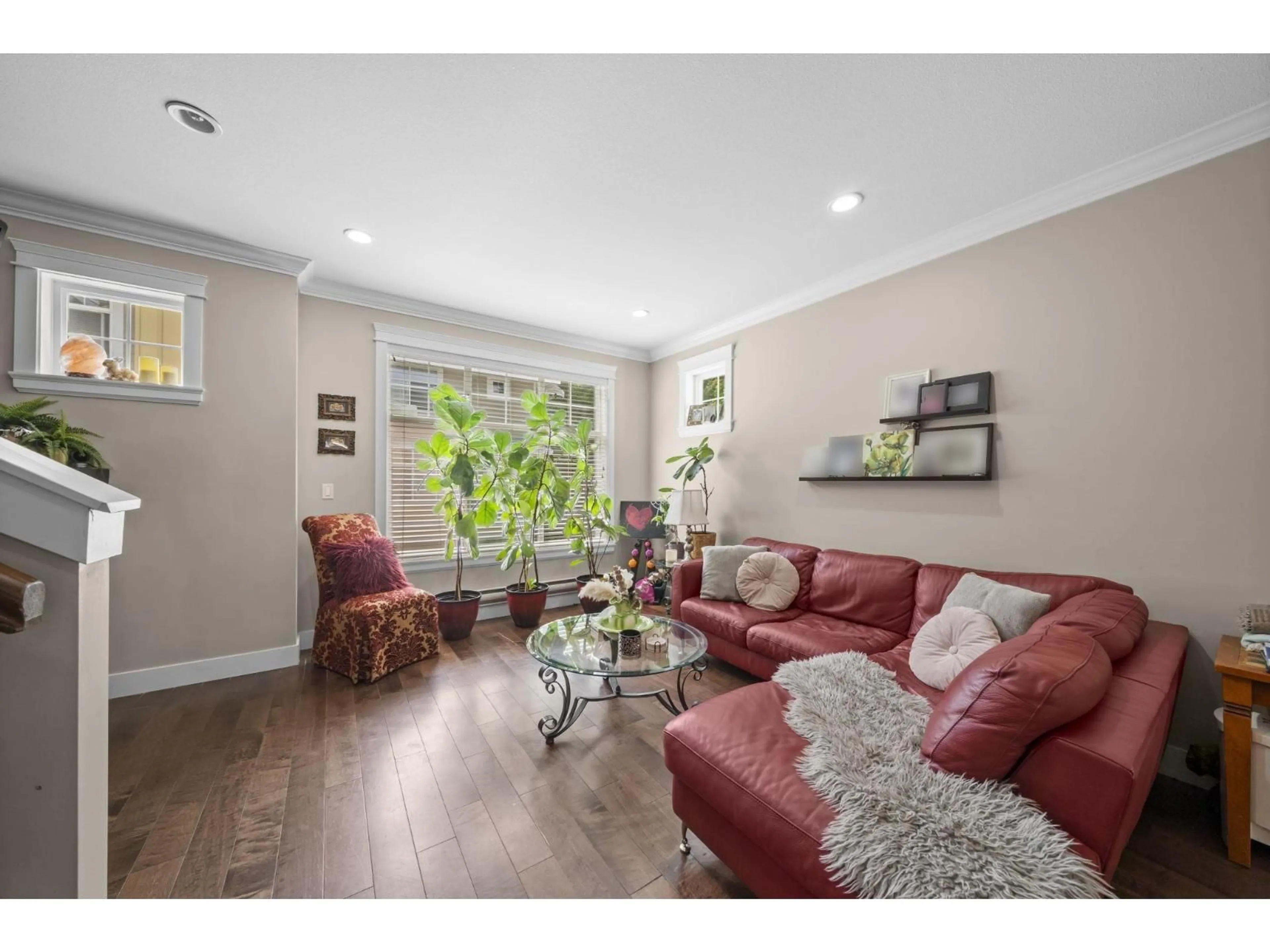 Living room with furniture, wood/laminate floor for 17 - 17171 2B AVENUE, Surrey British Columbia V3Z9R1