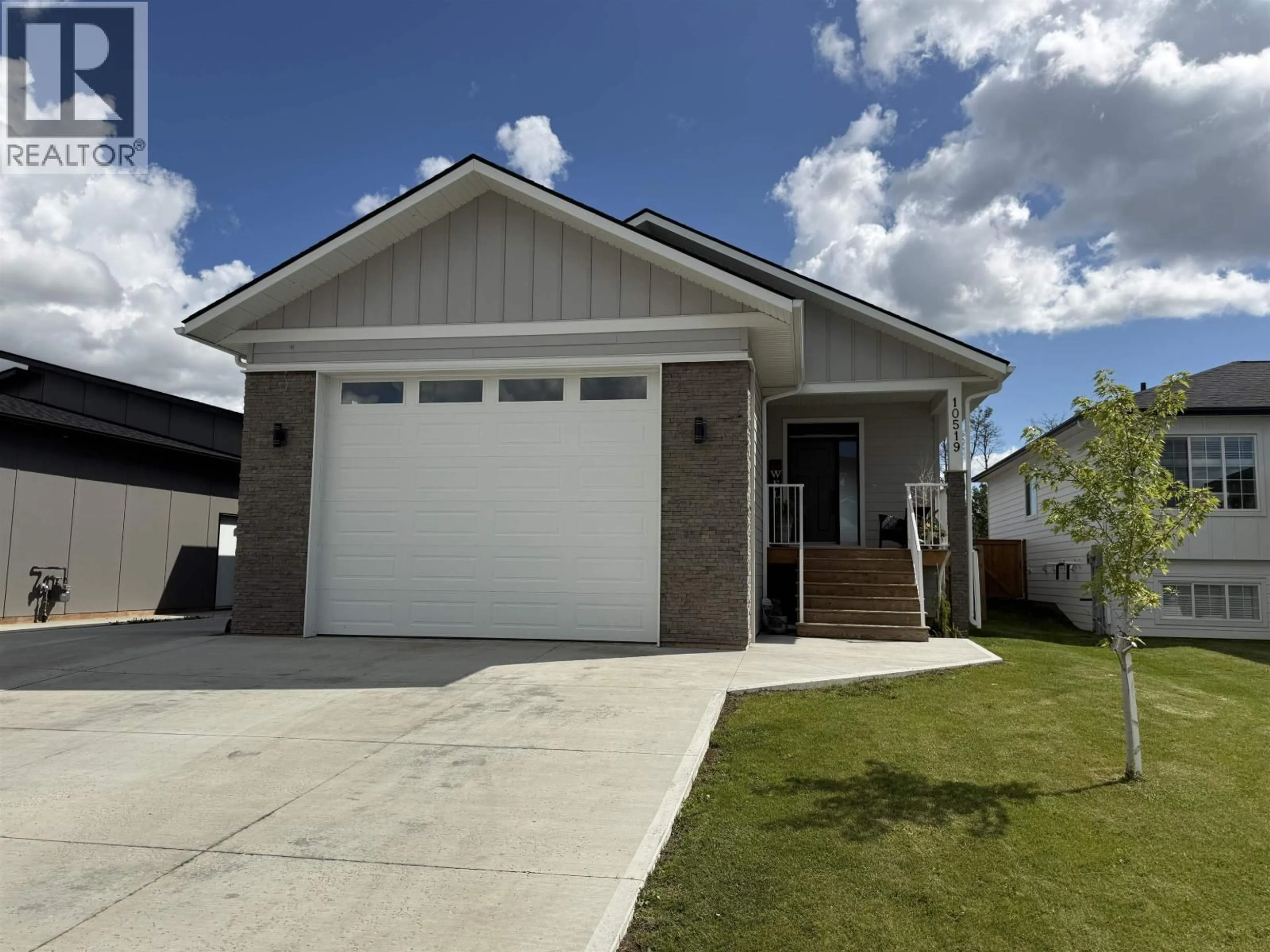 Home with vinyl exterior material, street for 10519 118 AVENUE, Fort St. John British Columbia V1J0M8