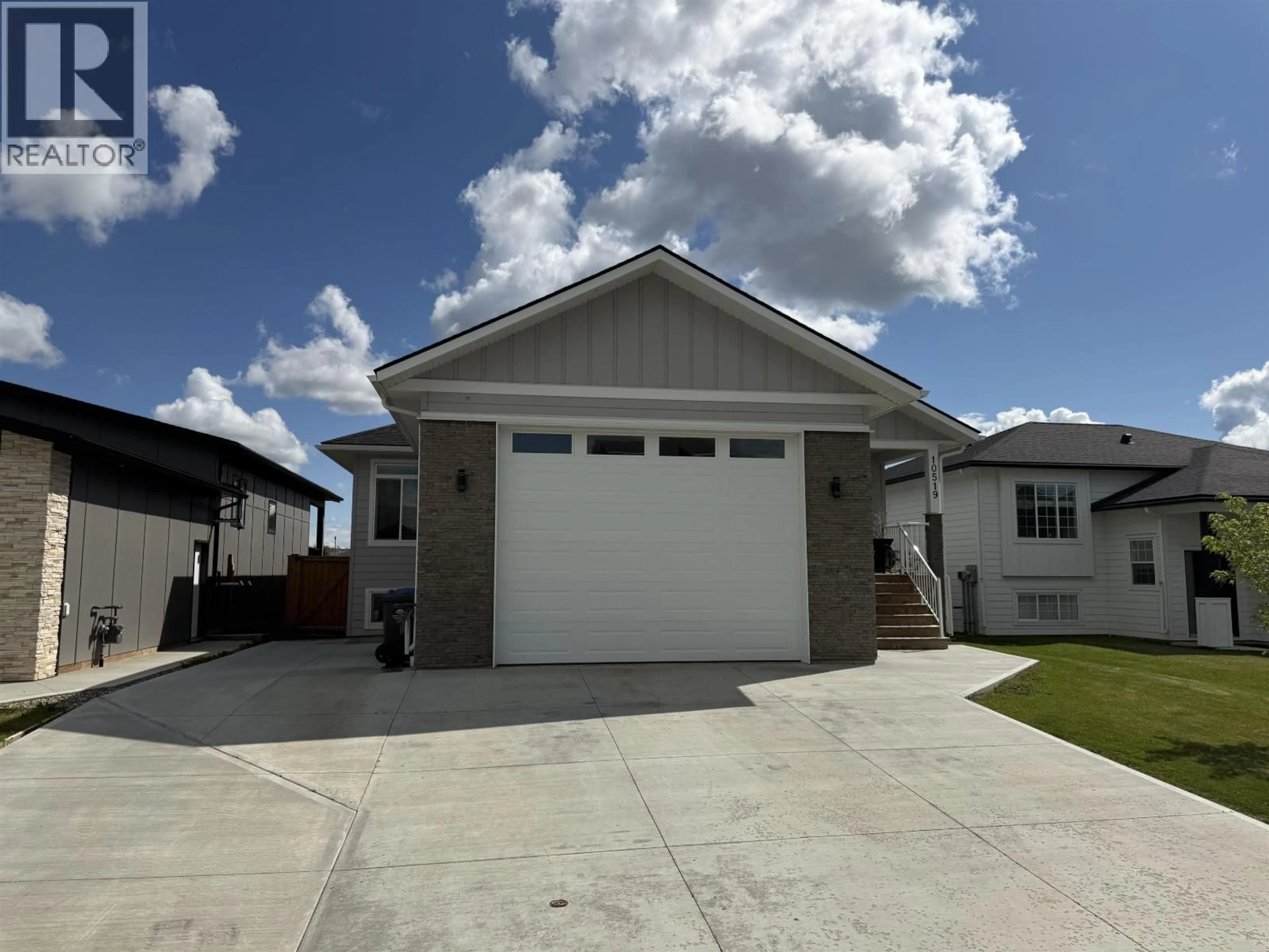 Home with vinyl exterior material, street for 10519 118 AVENUE, Fort St. John British Columbia V1J0M8