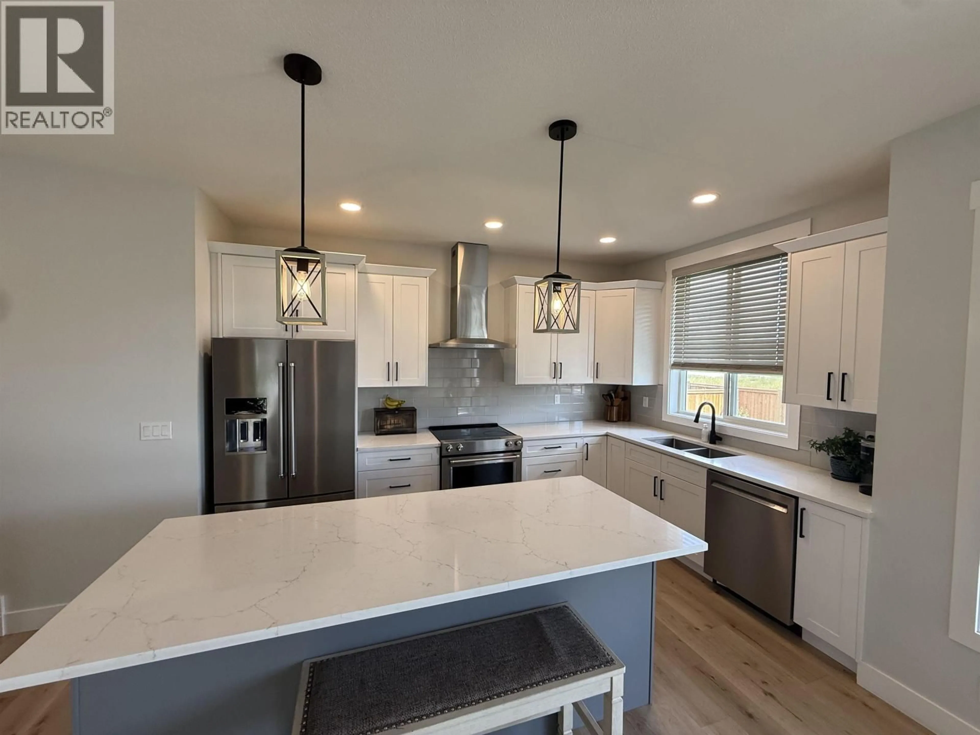 Open concept kitchen, unknown for 10519 118 AVENUE, Fort St. John British Columbia V1J0M8