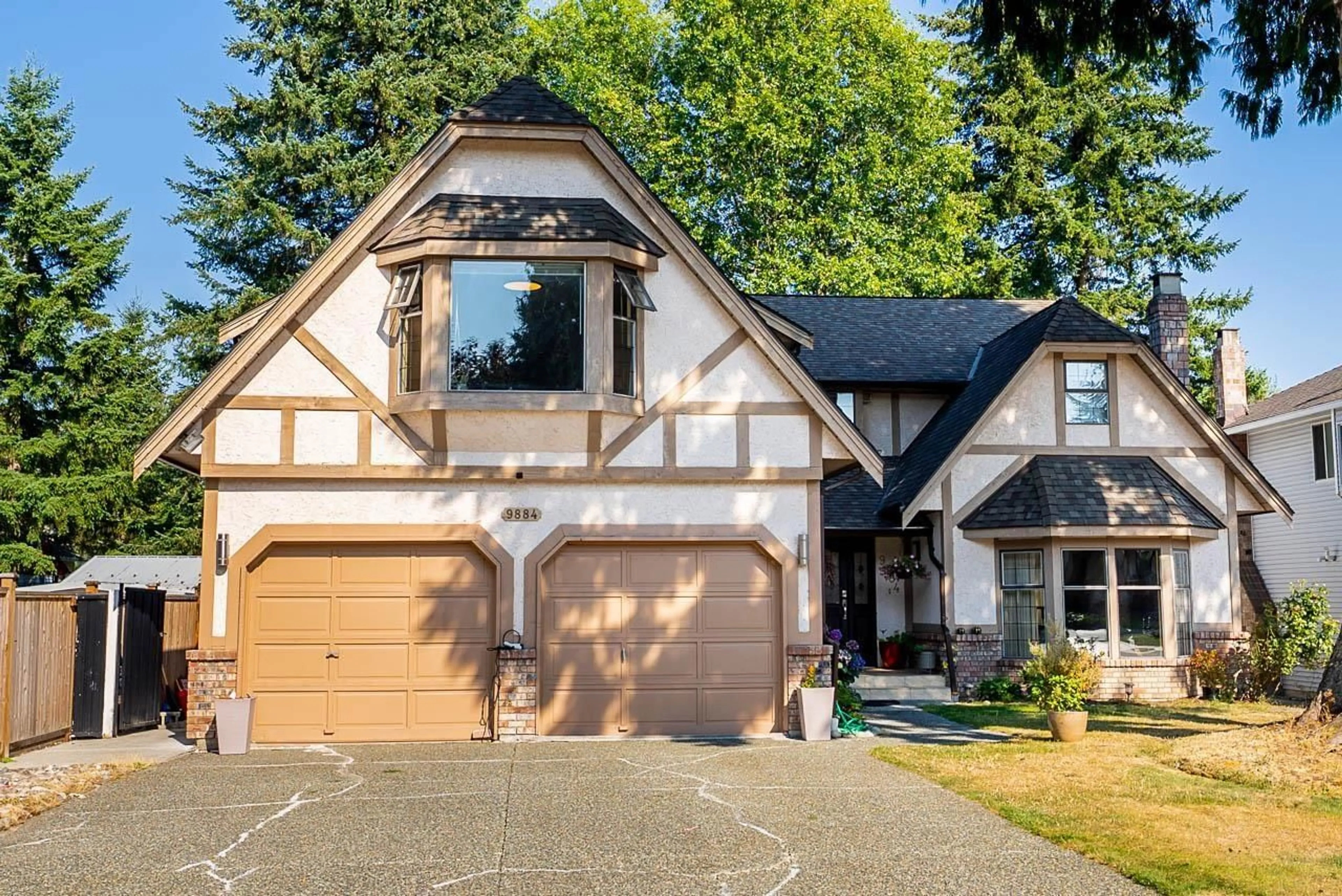 Home with vinyl exterior material, street for 9884 158A STREET, Surrey British Columbia V4N2A5