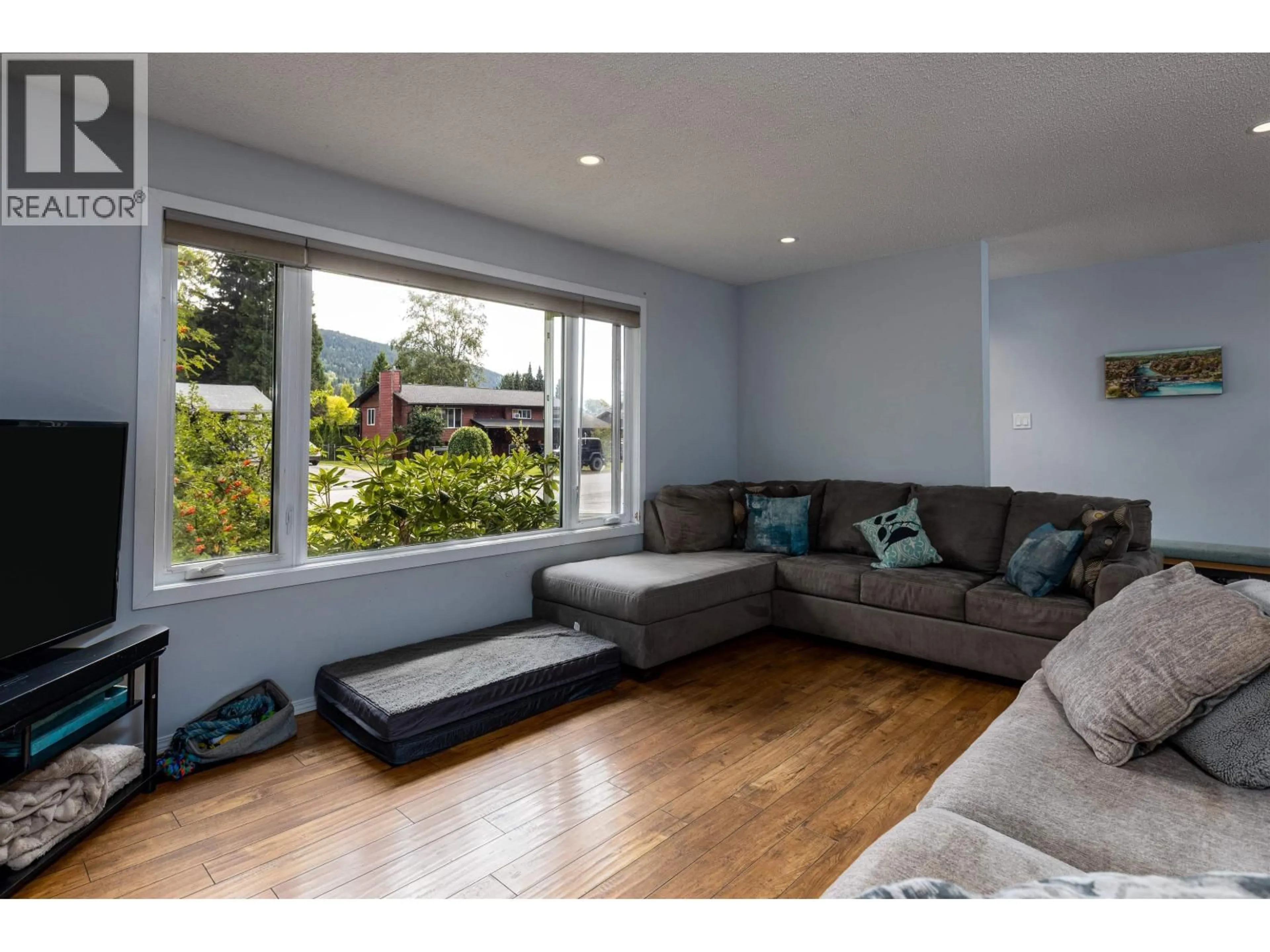 Living room with furniture, wood/laminate floor for 4121 SKOGLUND STREET, Terrace British Columbia V8G2X1