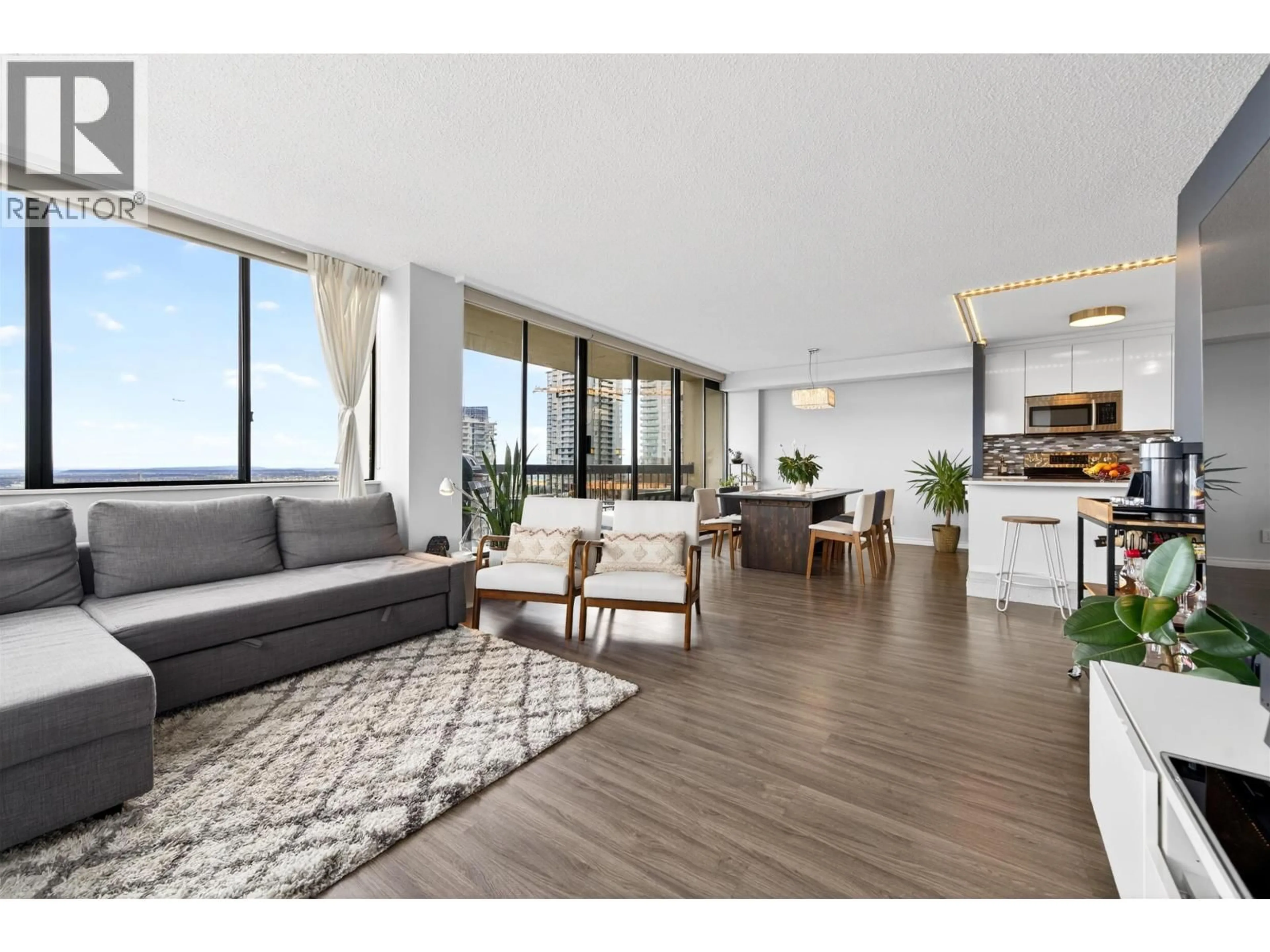 Living room with furniture, wood/laminate floor for 1903 - 6540 BURLINGTON AVENUE, Burnaby British Columbia V5H4G3