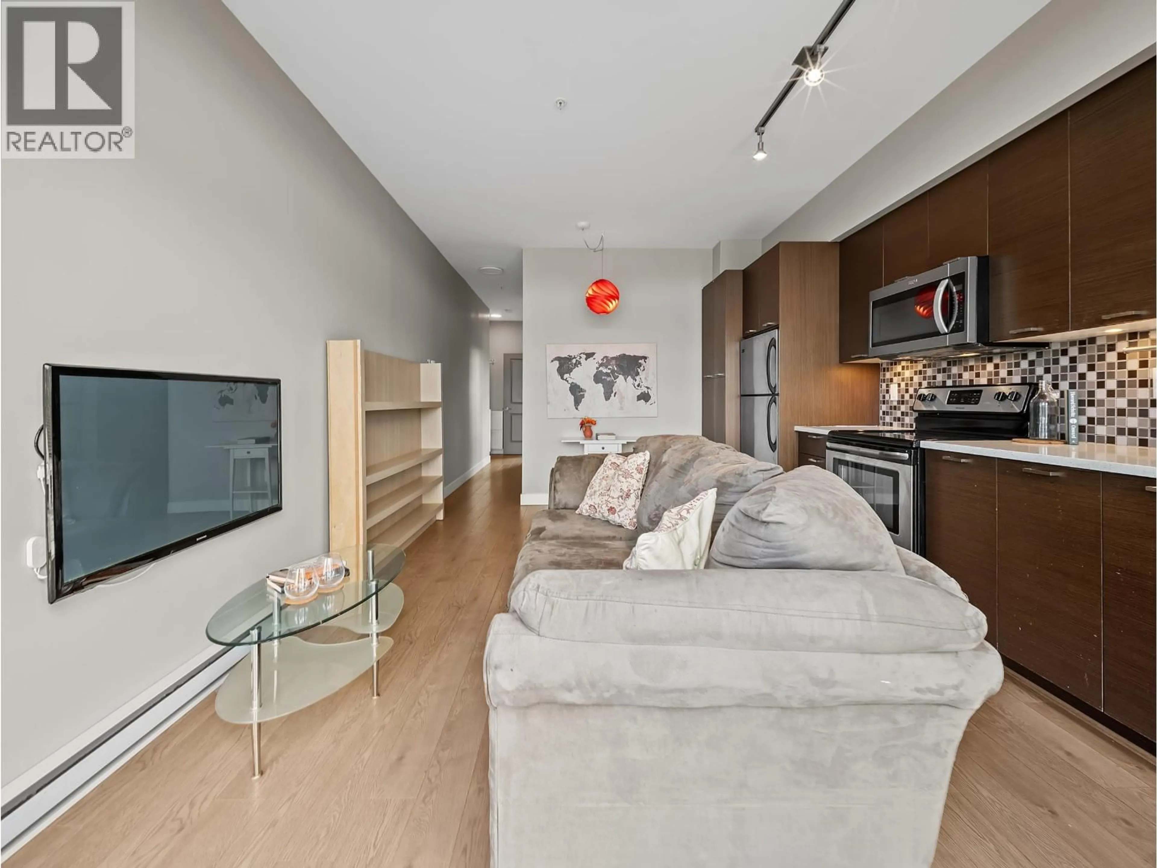 Living room with furniture, unknown for 301 - 4372 FRASER STREET, Vancouver British Columbia V5V4G3