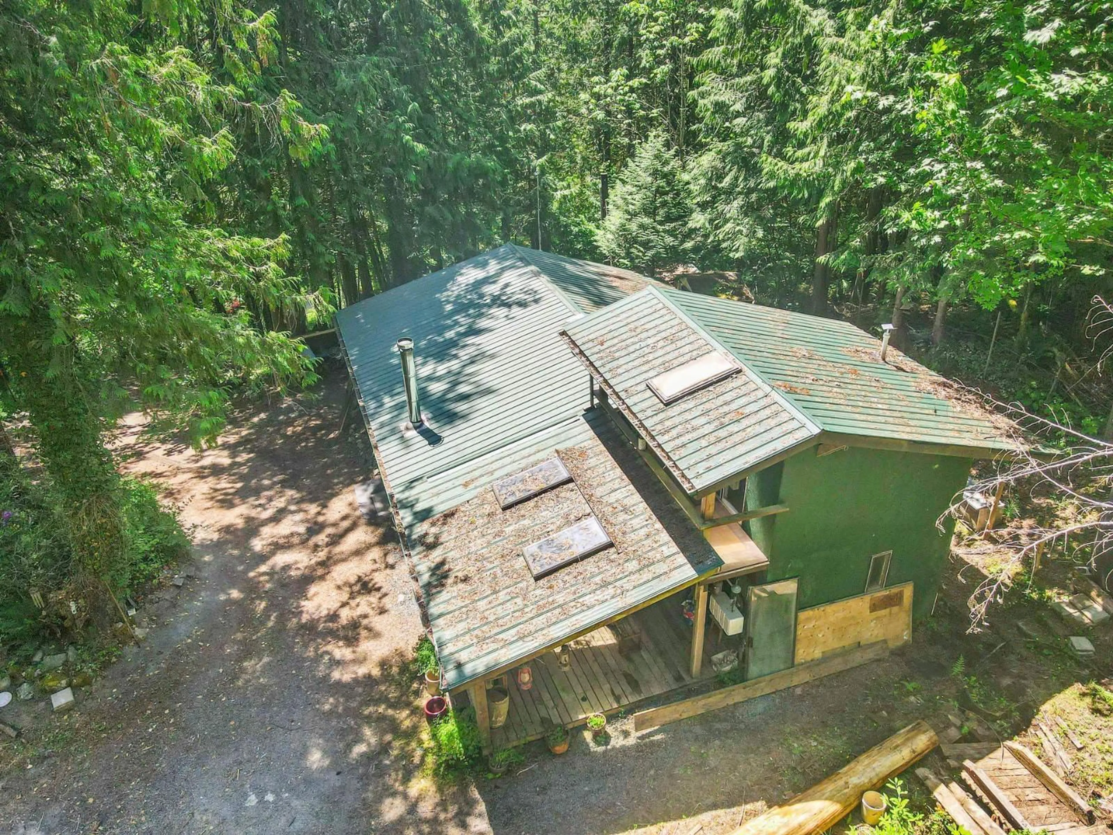 A pic from outside/outdoor area/front of a property/back of a property/a pic from drone, forest/trees view for 4139 SLESSE ROAD, Chilliwack British Columbia V4Z1B3