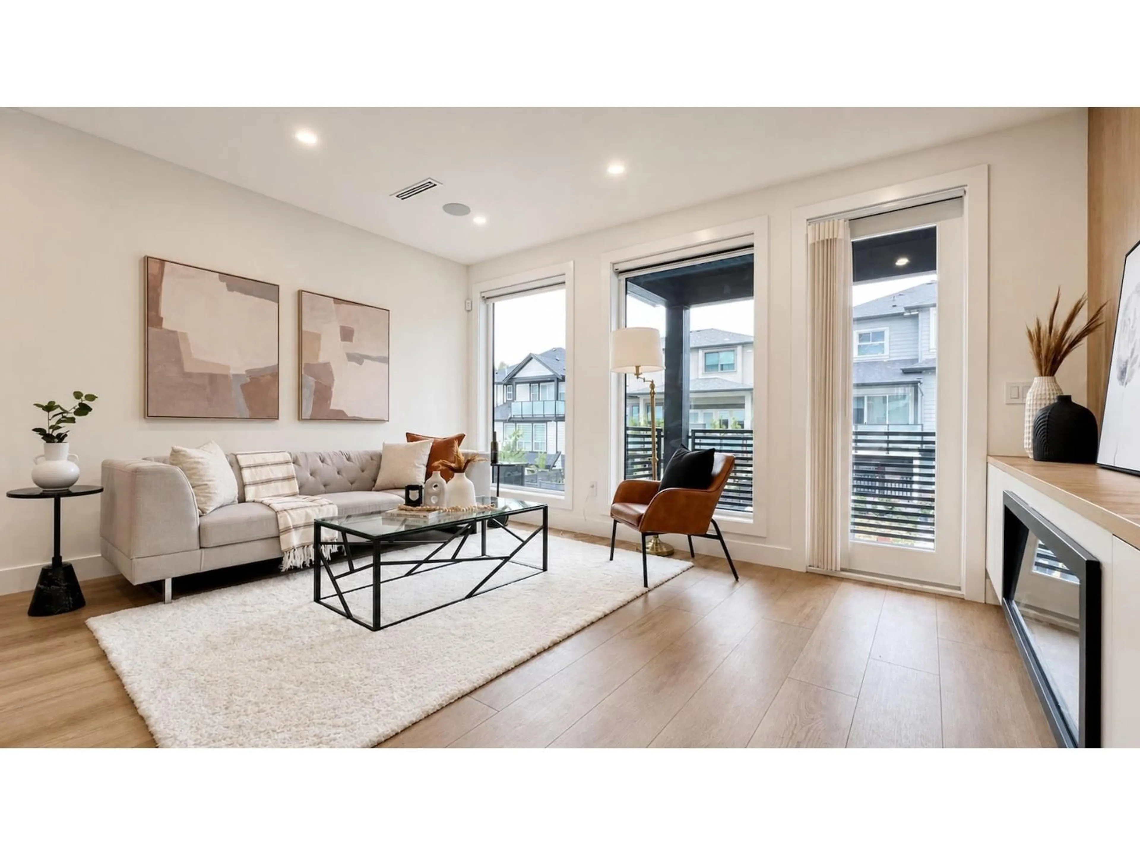 Living room with furniture, wood/laminate floor for 16521 20 AVENUE, Surrey British Columbia V3Z0X6