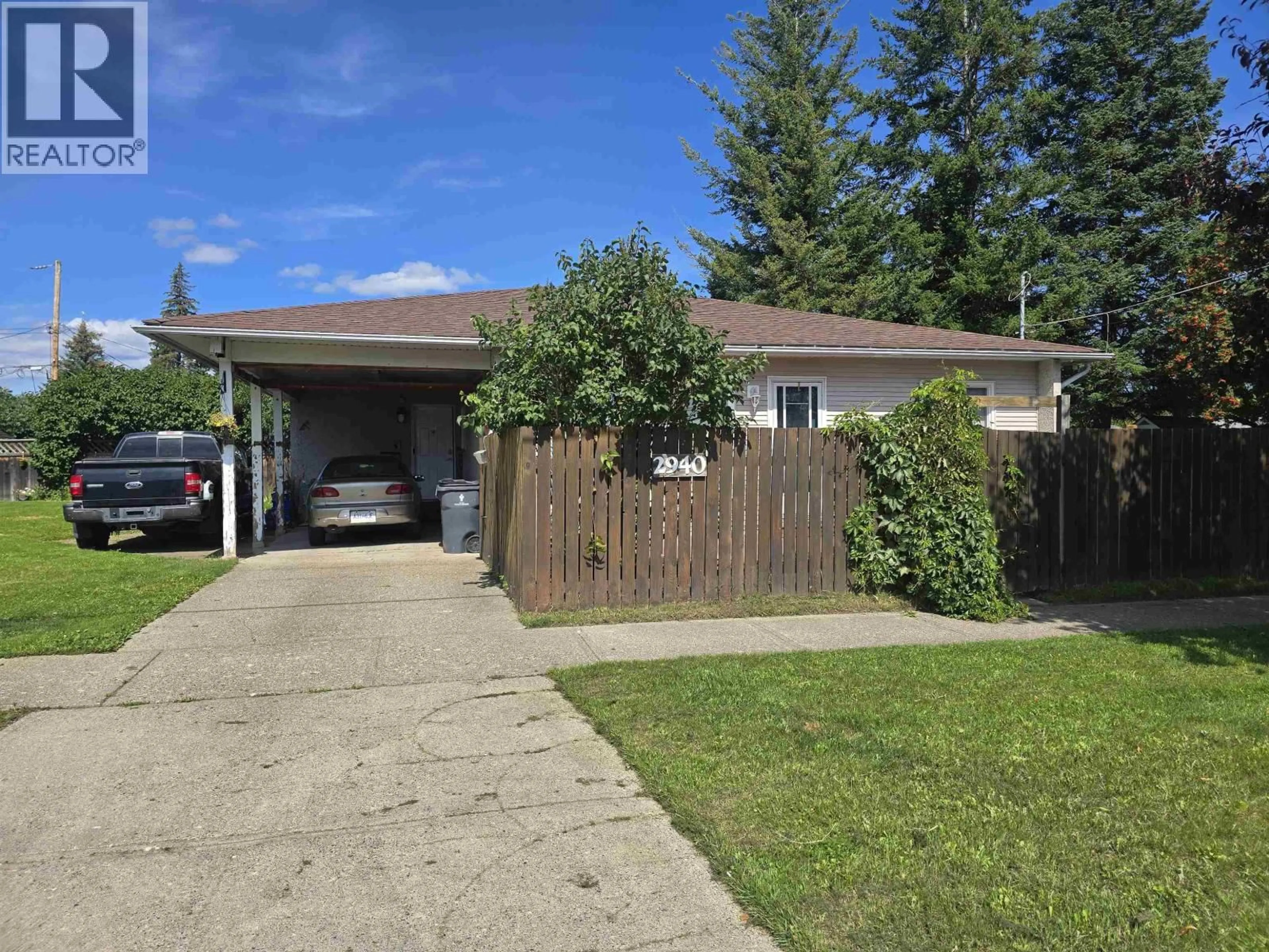 A pic from outside/outdoor area/front of a property/back of a property/a pic from drone, street for 2940 2ND AVENUE, Prince George British Columbia V2M1E8