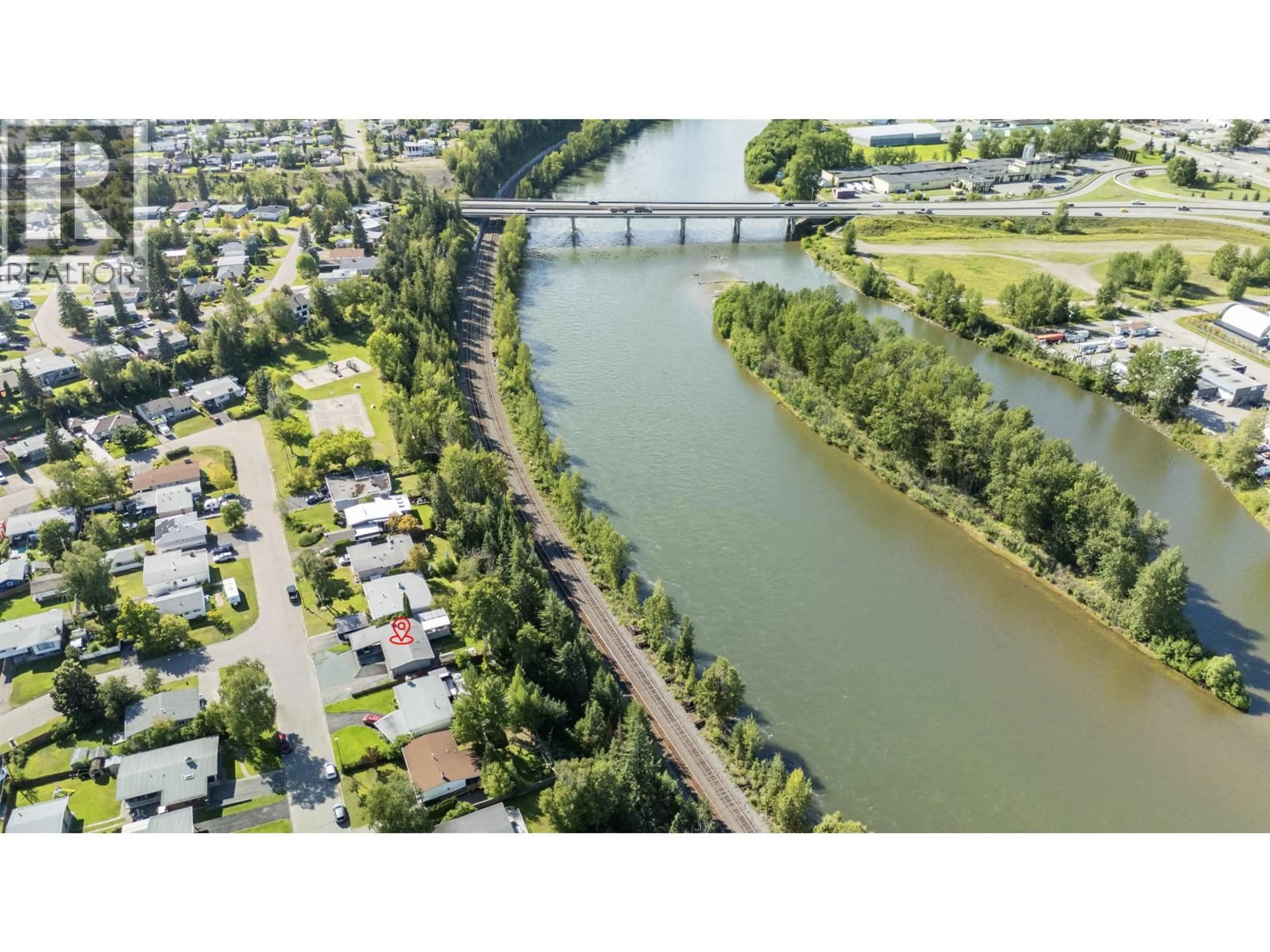 A pic from outside/outdoor area/front of a property/back of a property/a pic from drone, water/lake/river/ocean view for 2760 HAMMOND AVENUE, Prince George British Columbia V2M1A5
