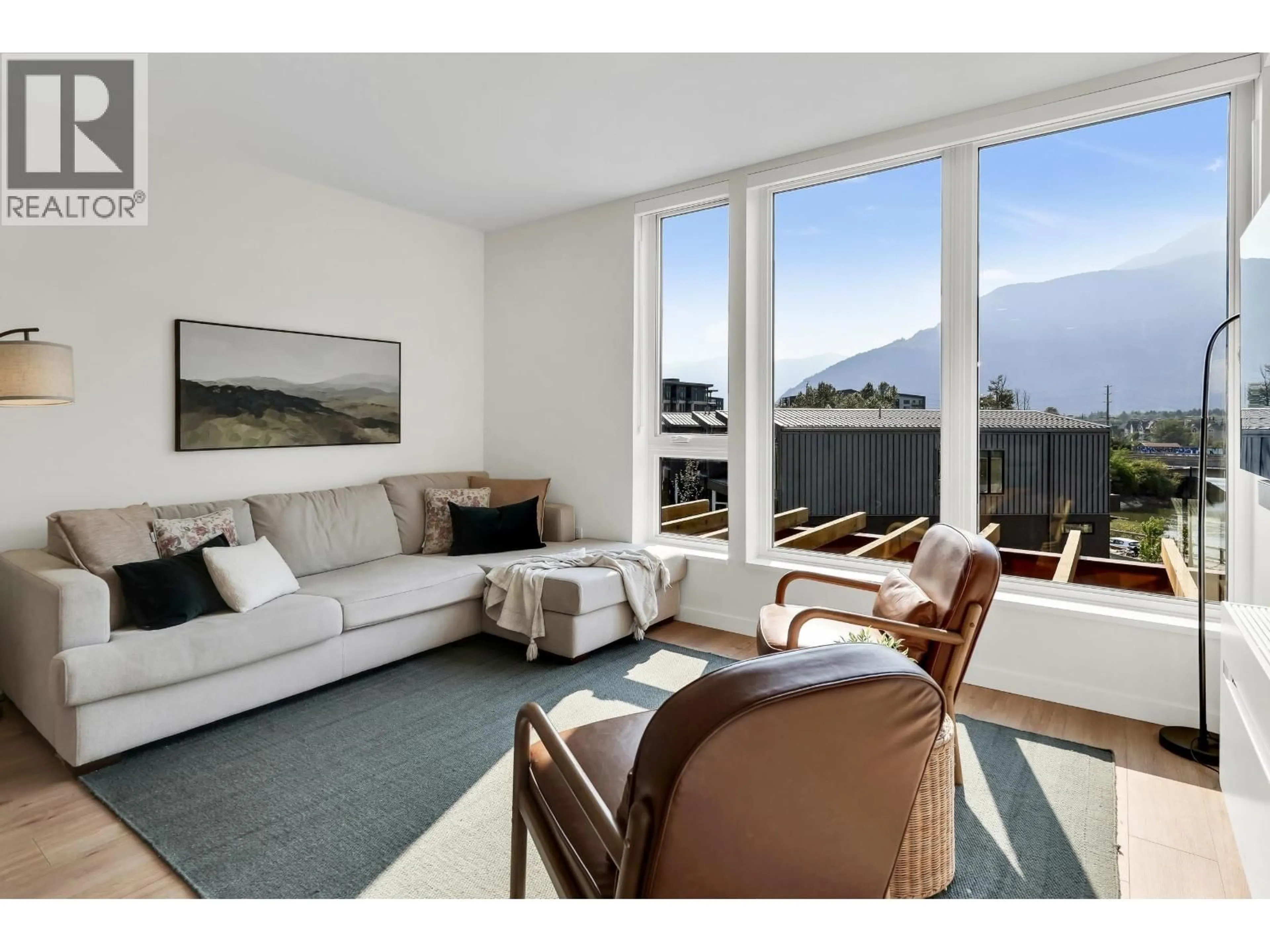 Living room with furniture, unknown for 313 - 1506 SCOTT CRESCENT, Squamish British Columbia V8B1G4