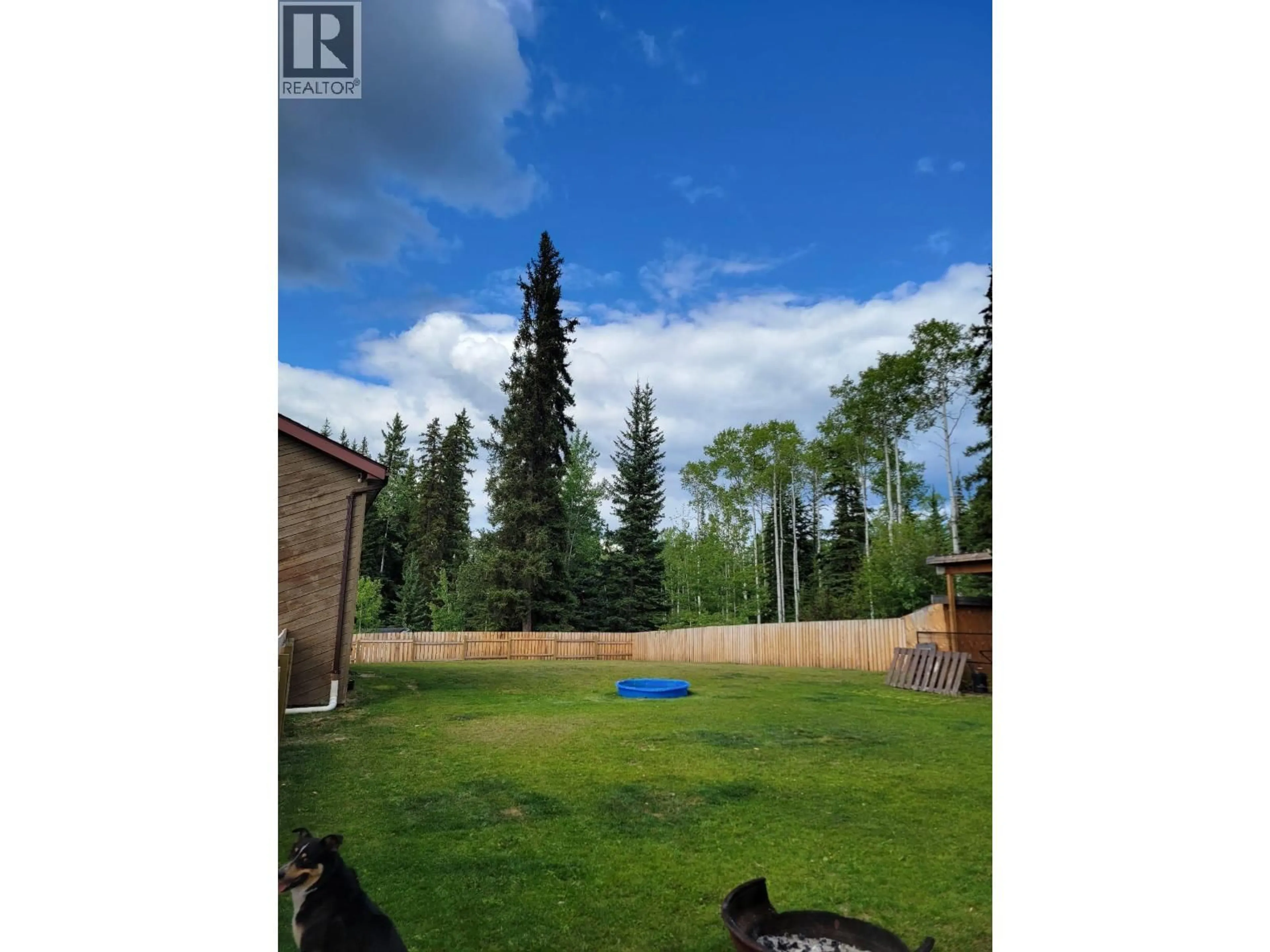 A pic from outside/outdoor area/front of a property/back of a property/a pic from drone, forest/trees view for 2330 OMINECA PLACE, Houston British Columbia V0J1Z2