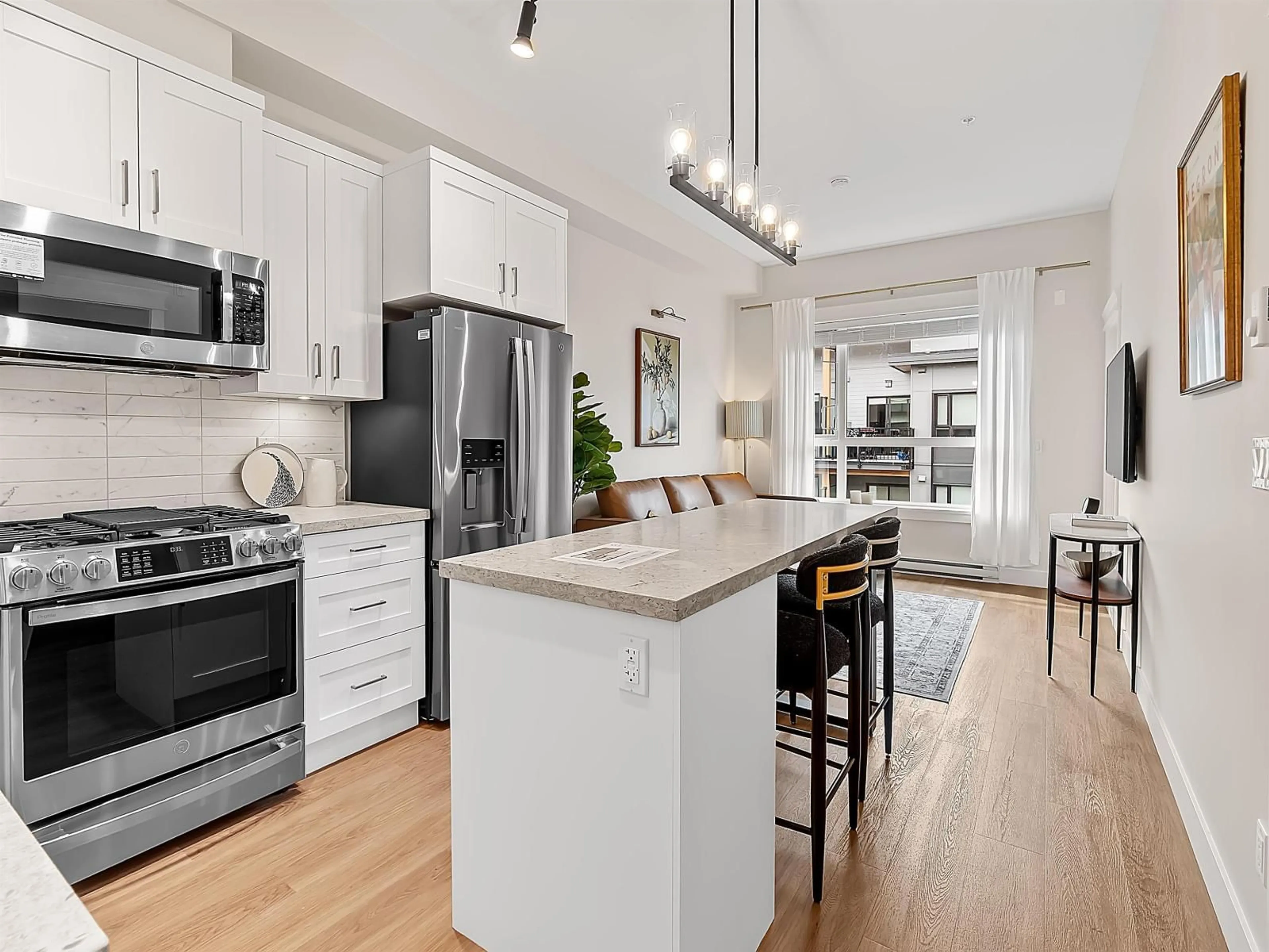 Open concept kitchen, unknown for 416 - 20926 83 AVENUE, Langley British Columbia V2Y3Y9