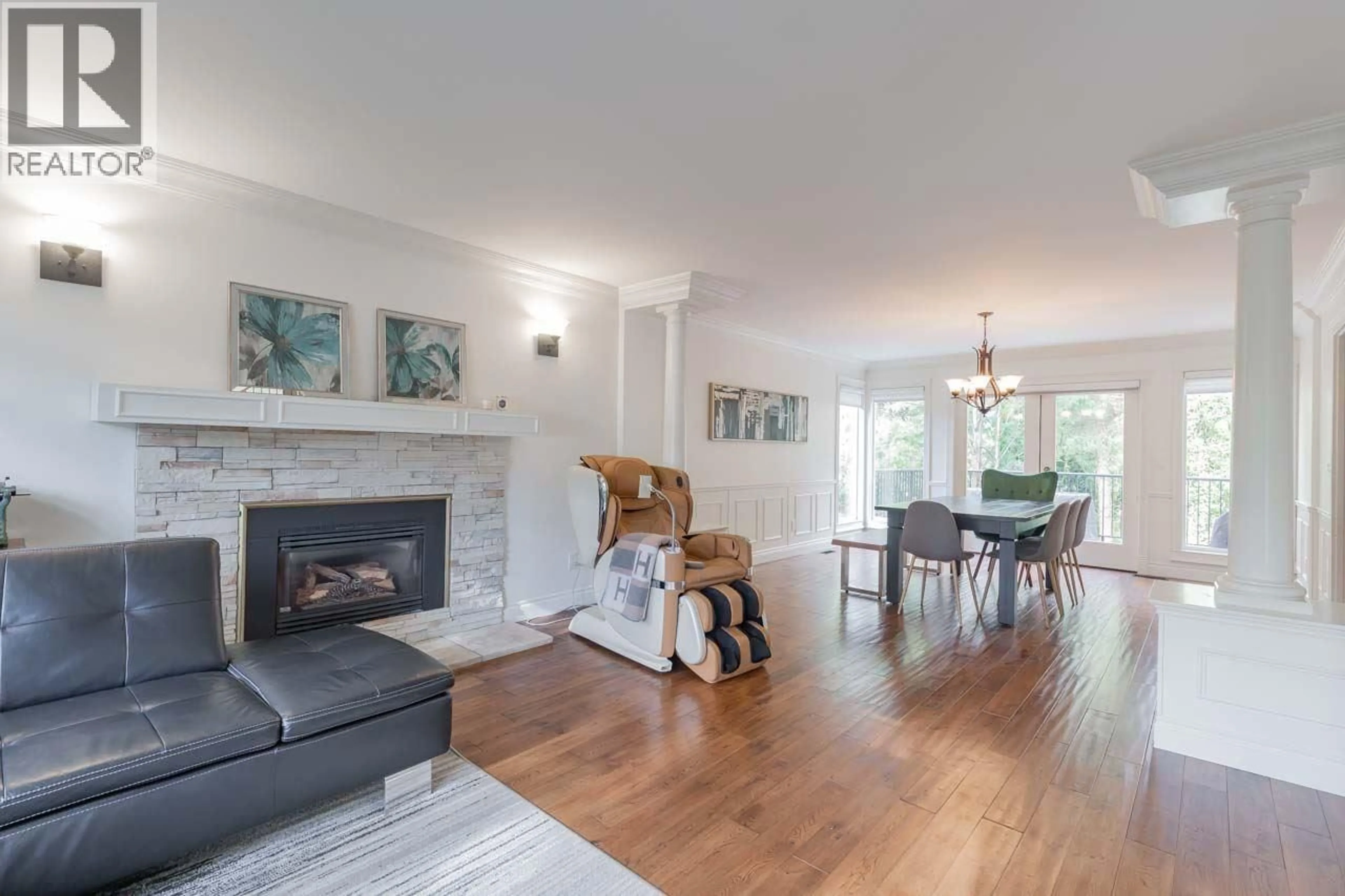 Living room with furniture, wood/laminate floor for 5890 BRAEMAR AVENUE, Burnaby British Columbia V5E3L5