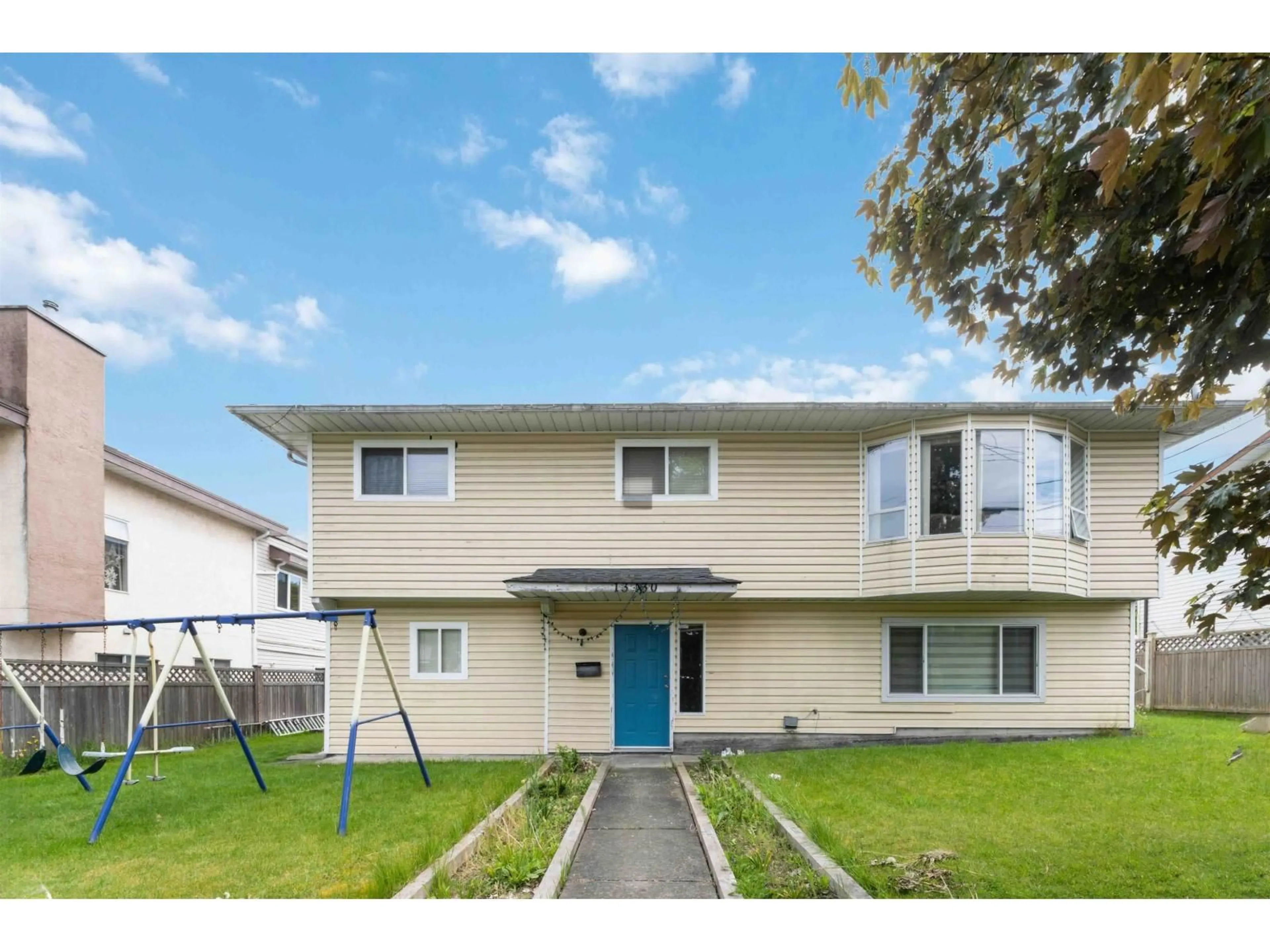 Home with vinyl exterior material, street for 13430 64 AVENUE, Surrey British Columbia V3W8V6
