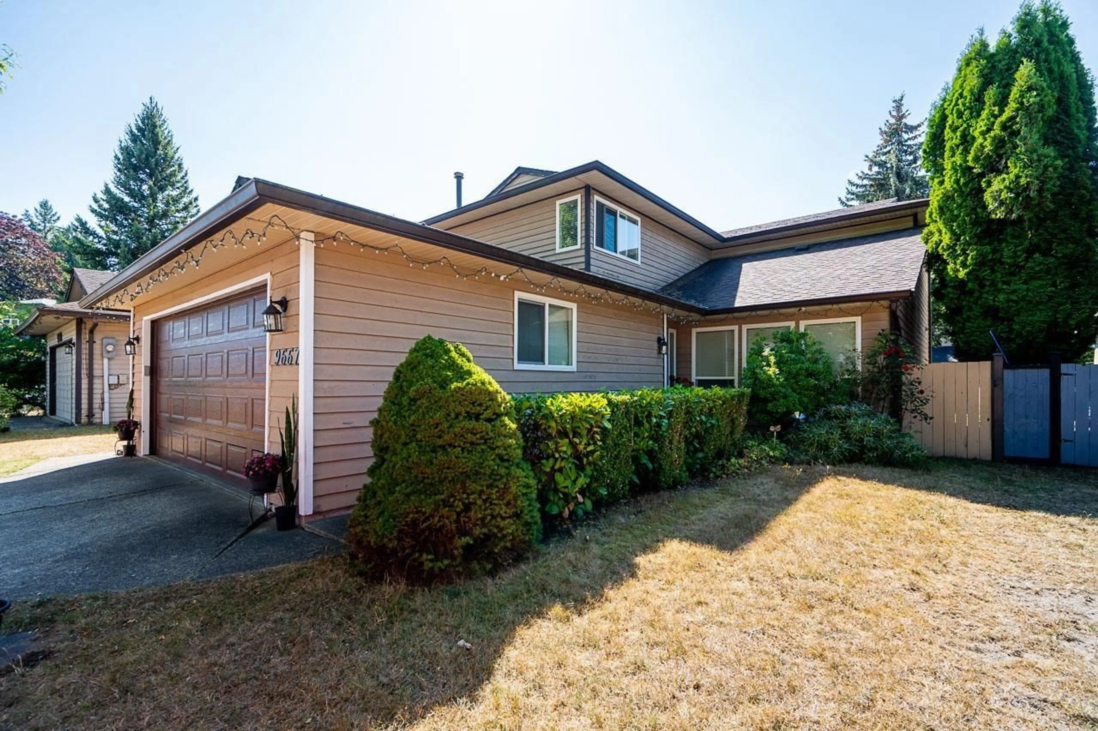 Home with vinyl exterior material, street for 9667 155 STREET, Surrey British Columbia V3R7Y9