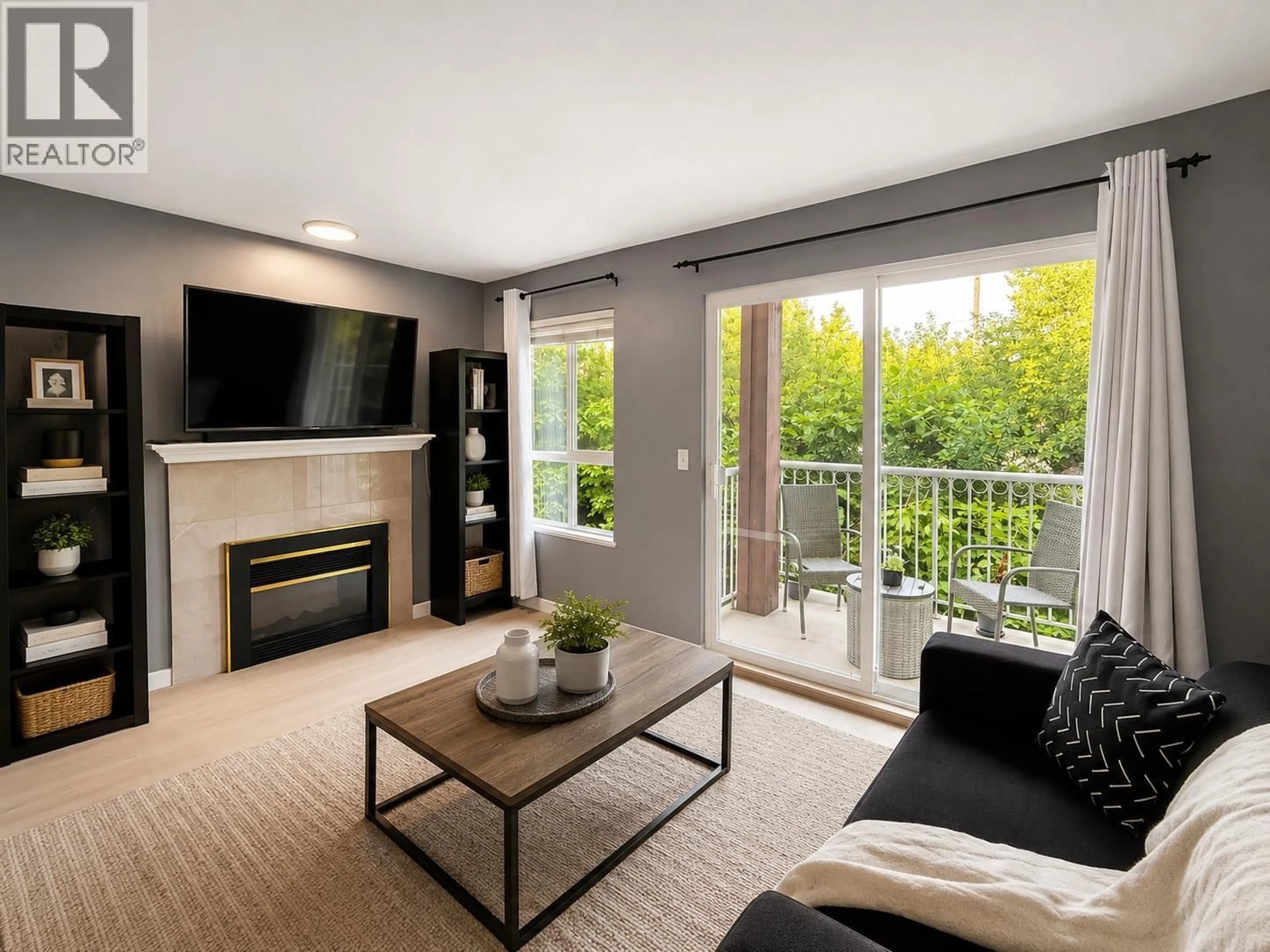 Living room with furniture, unknown for 208 - 5355 BOUNDARY ROAD, Vancouver British Columbia V5R6G2