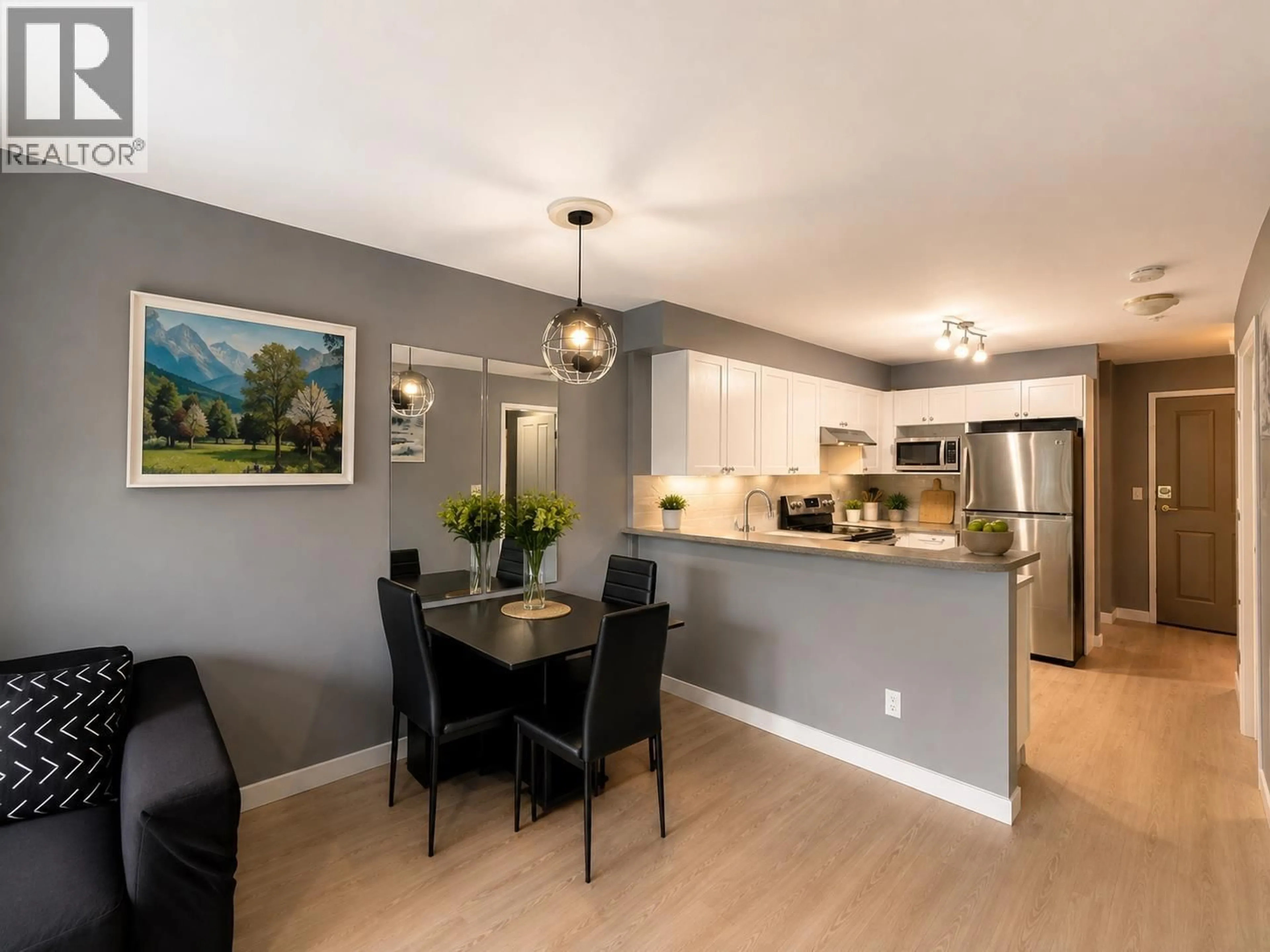 Open concept kitchen, wood/laminate floor for 208 - 5355 BOUNDARY ROAD, Vancouver British Columbia V5R6G2