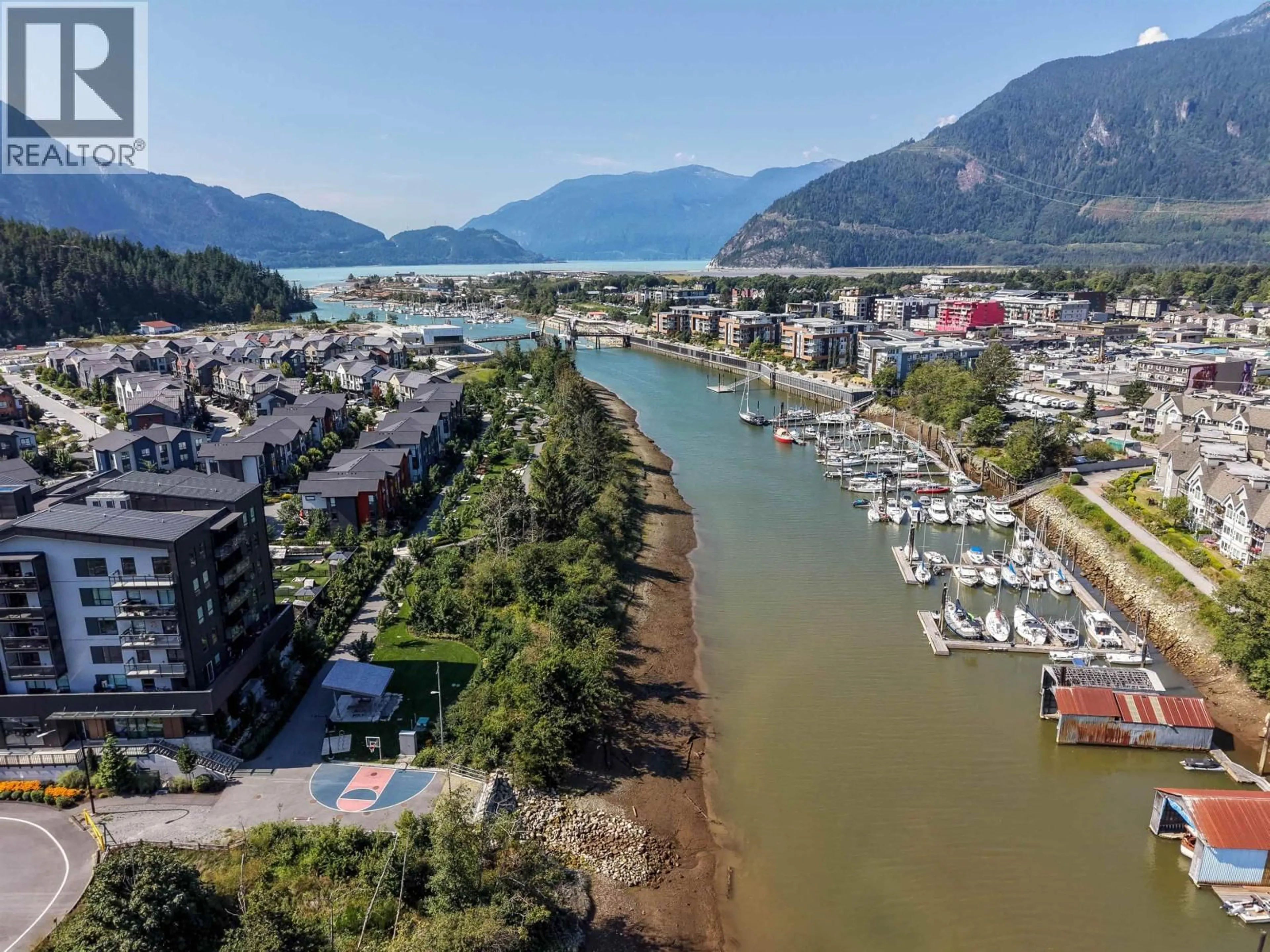 A pic from outside/outdoor area/front of a property/back of a property/a pic from drone, water/lake/river/ocean view for 1374 MARINASIDE PLACE, Squamish British Columbia V8B1A8