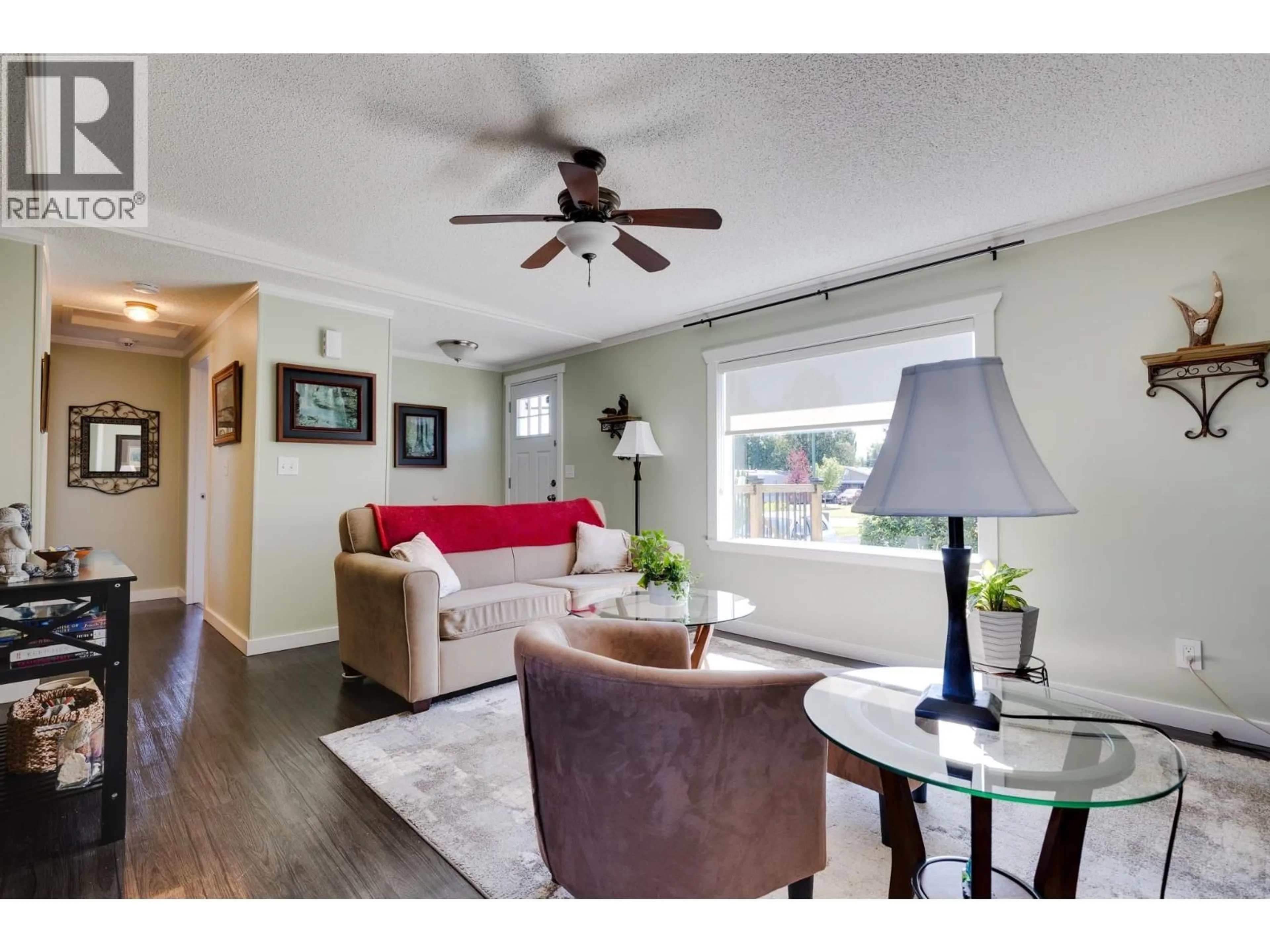 Living room with furniture, wood/laminate floor for 4616 GRAY DRIVE, Prince George British Columbia V2K4Y4