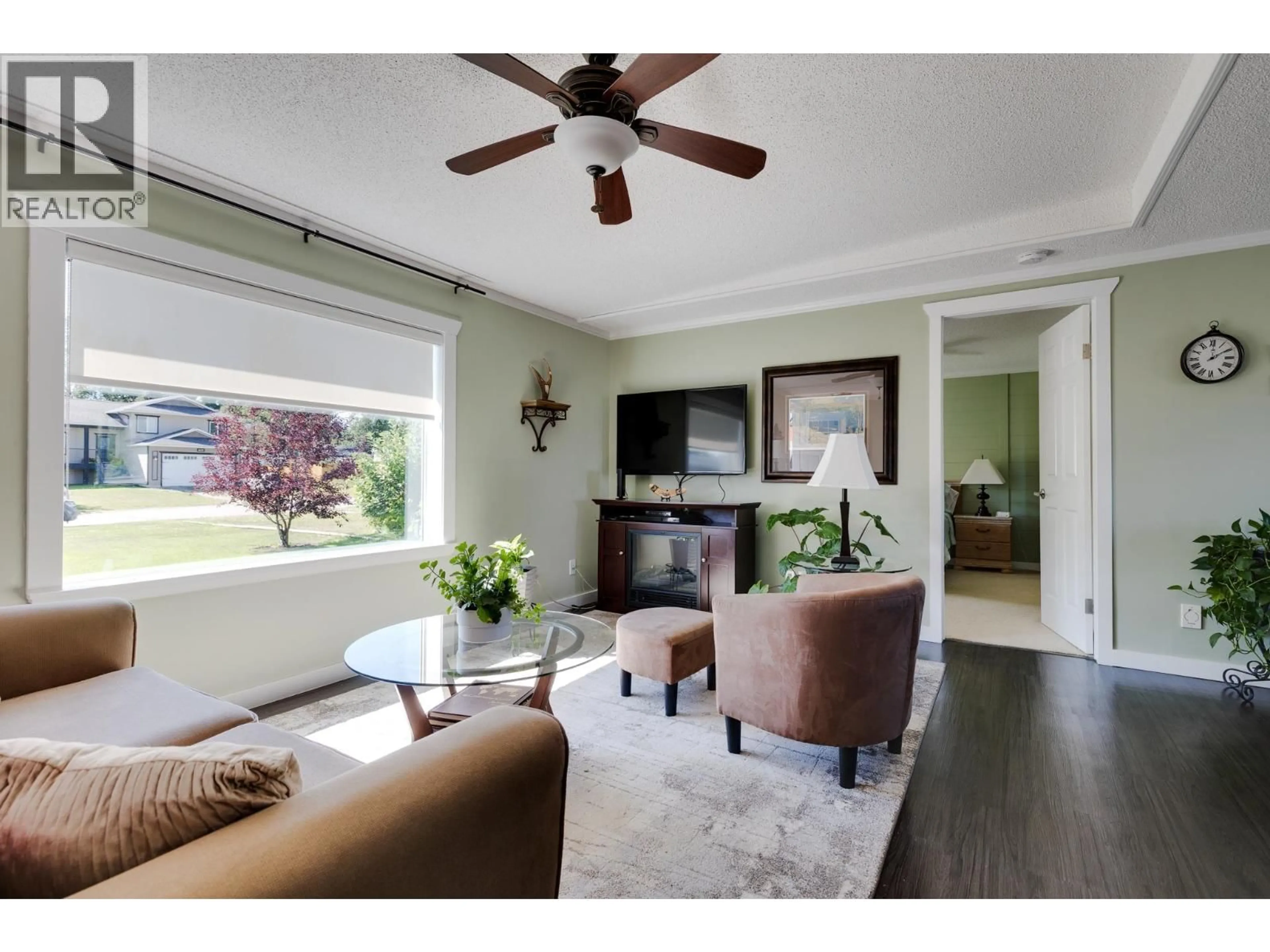 Living room with furniture, wood/laminate floor for 4616 GRAY DRIVE, Prince George British Columbia V2K4Y4