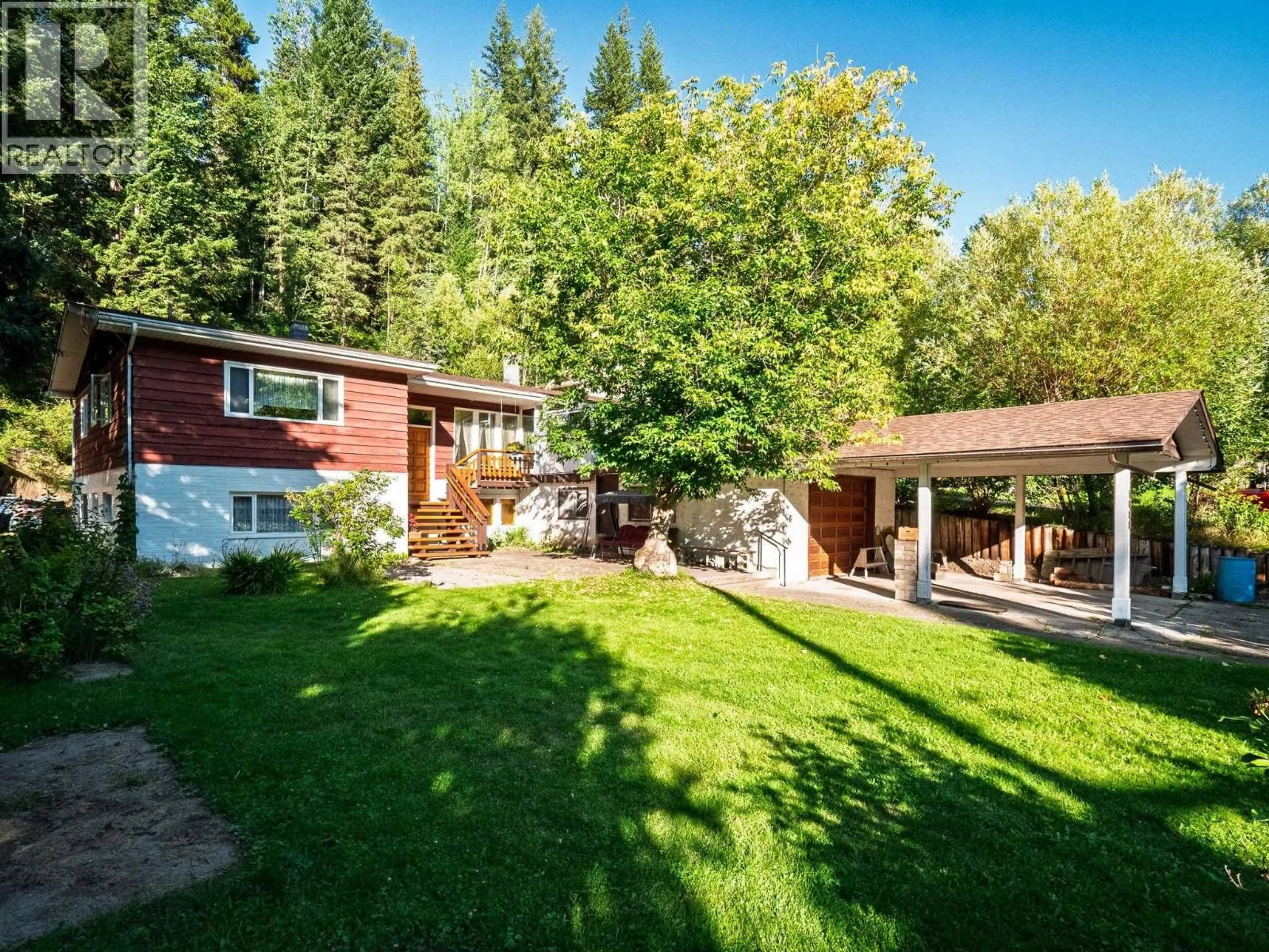 A pic from outside/outdoor area/front of a property/back of a property/a pic from drone, forest/trees view for 1688 AINTREE DRIVE, Prince George British Columbia V2K1H5