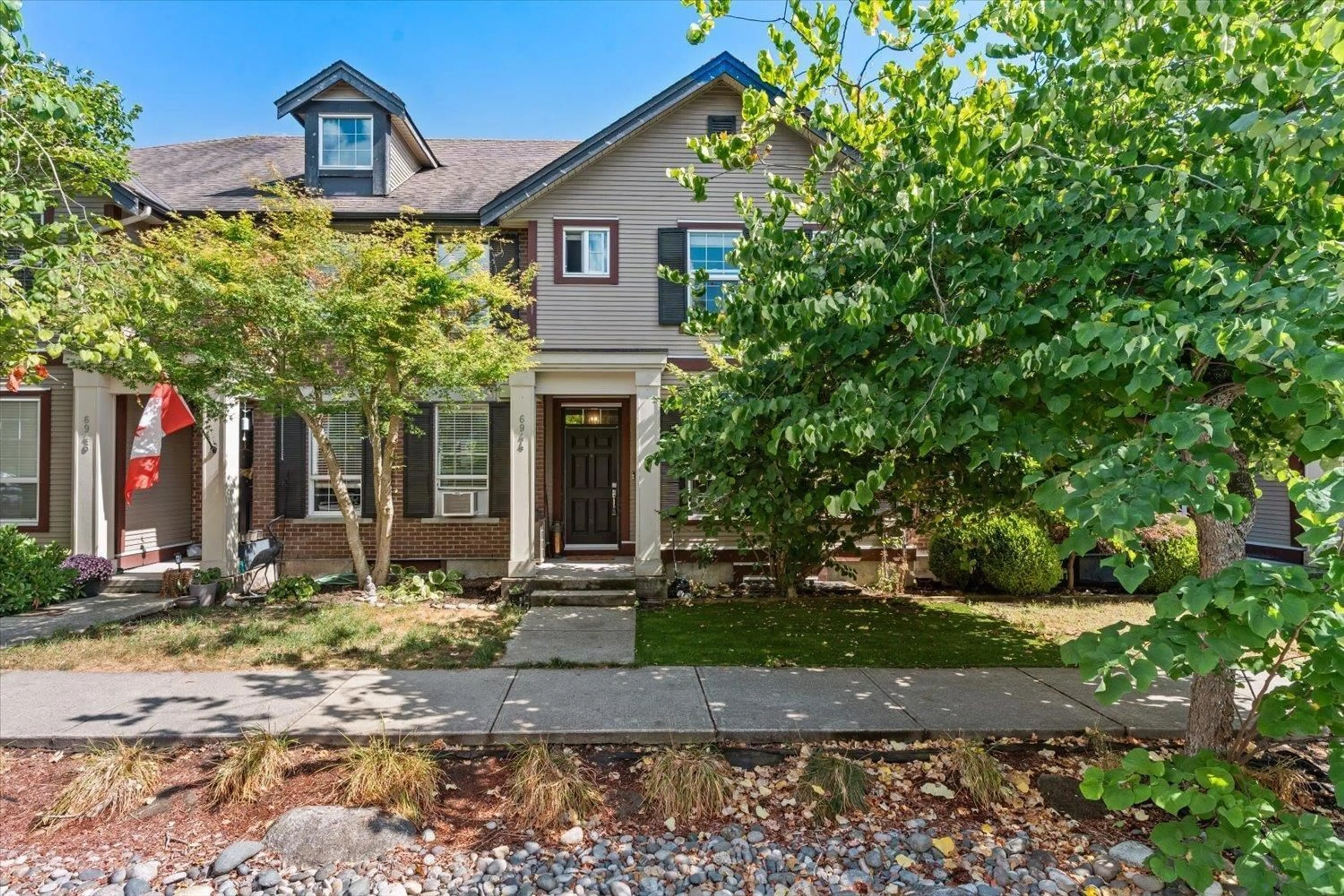 Home with brick exterior material, street for 6944 208A STREET, Langley British Columbia V2Y0G1