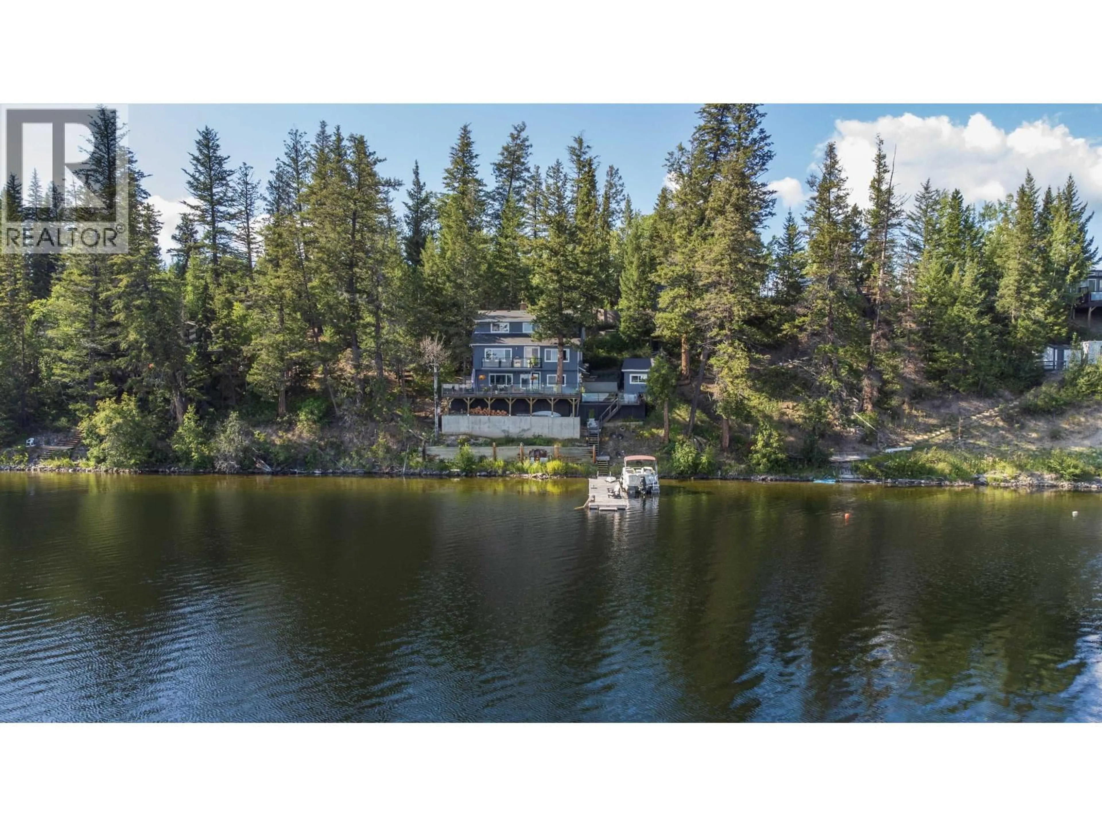 A pic from outside/outdoor area/front of a property/back of a property/a pic from drone, water/lake/river/ocean view for 52495 GUEST ROAD, Cluculz Lake British Columbia V0J3A3